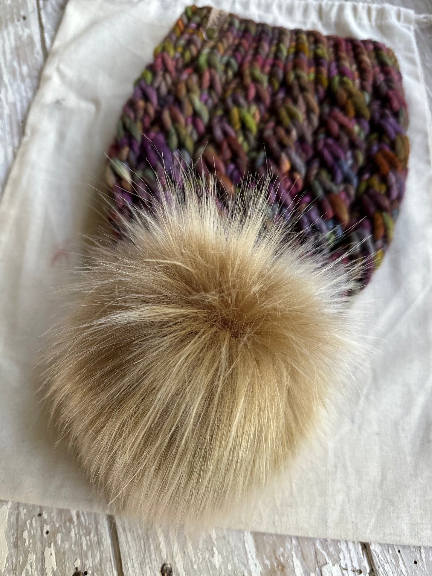 Merino wool knit hat with faux fur Pom