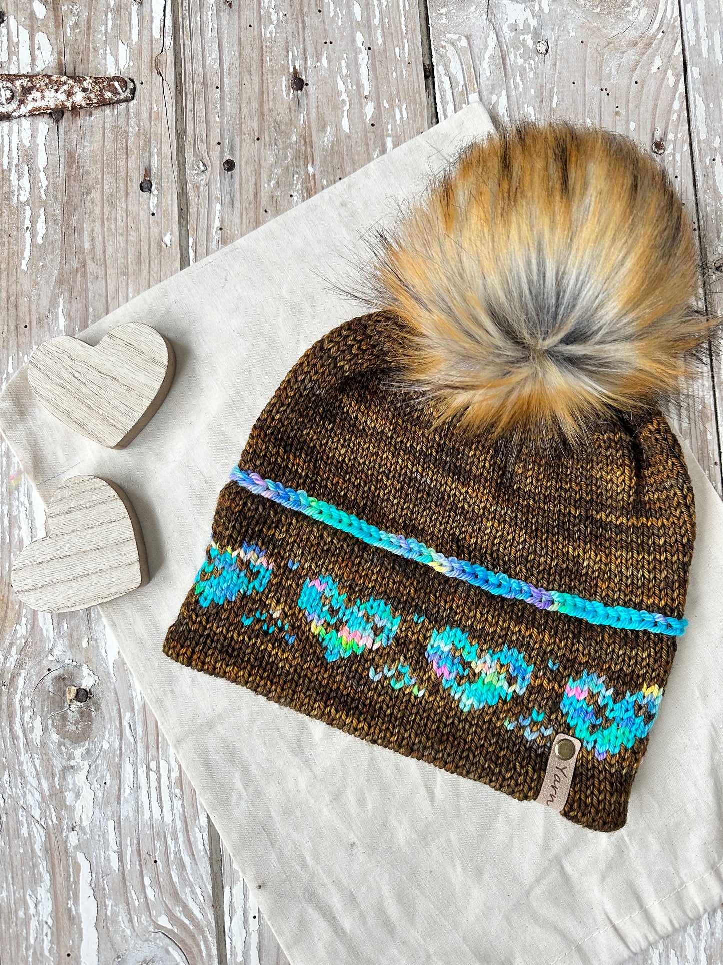 Merino wool knit hat with faux fur Pom