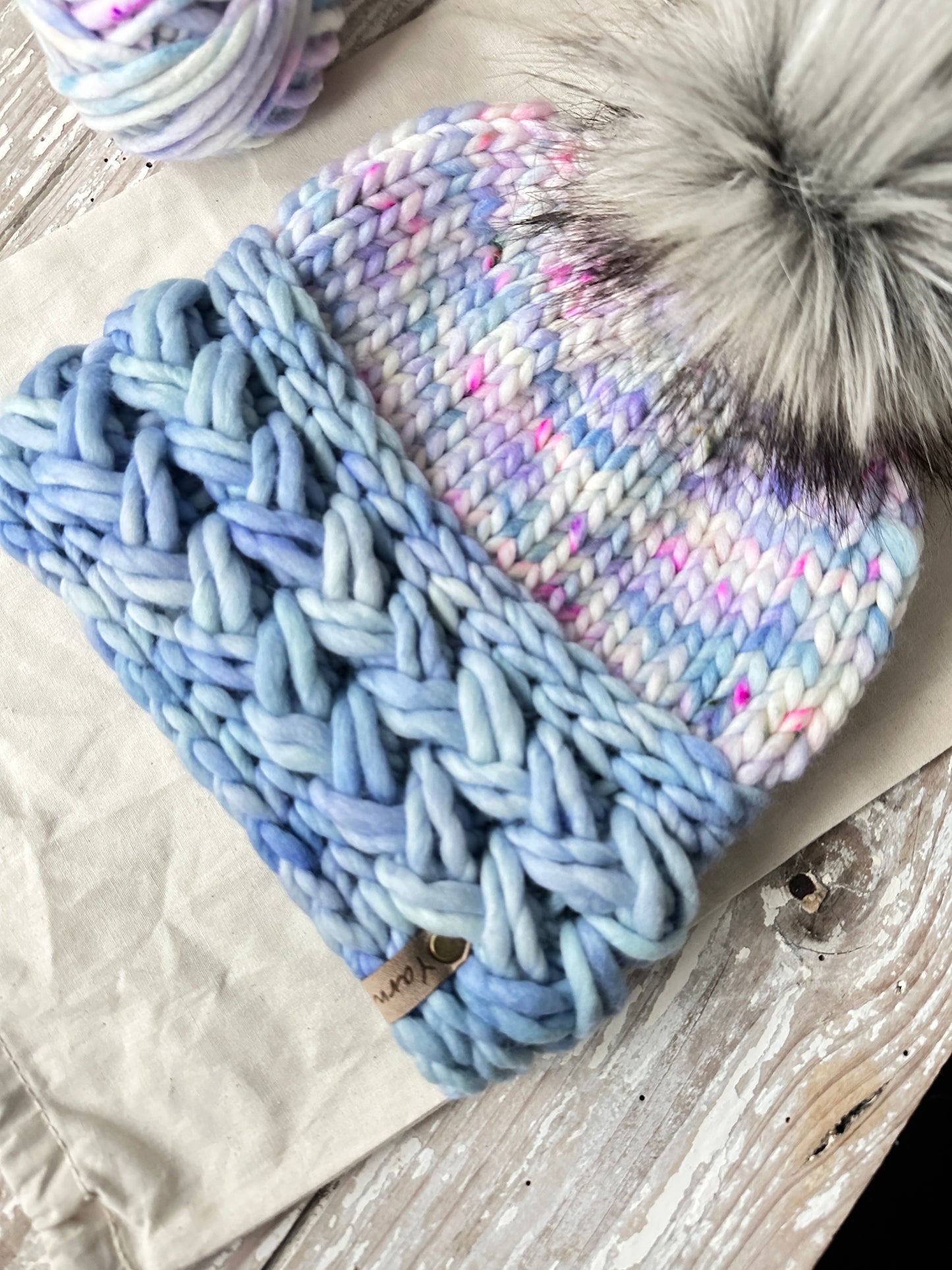 Merino wool knit hat with faux fur Pom