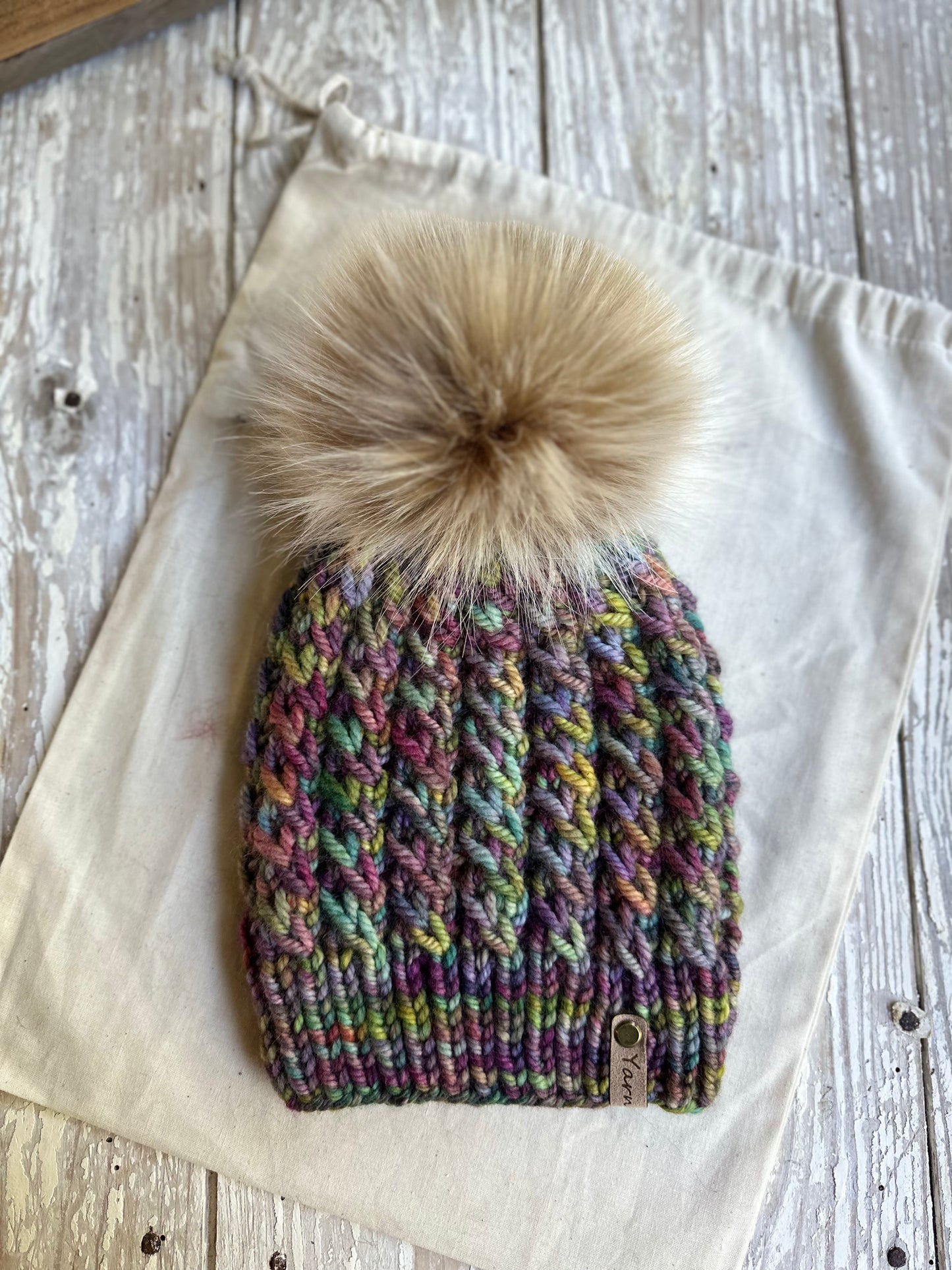 Merino wool knit hat with faux fur Pom