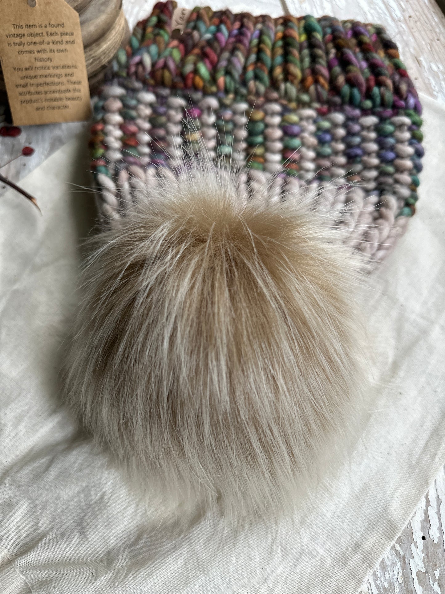 Merino wool knit hat with faux fur Pom