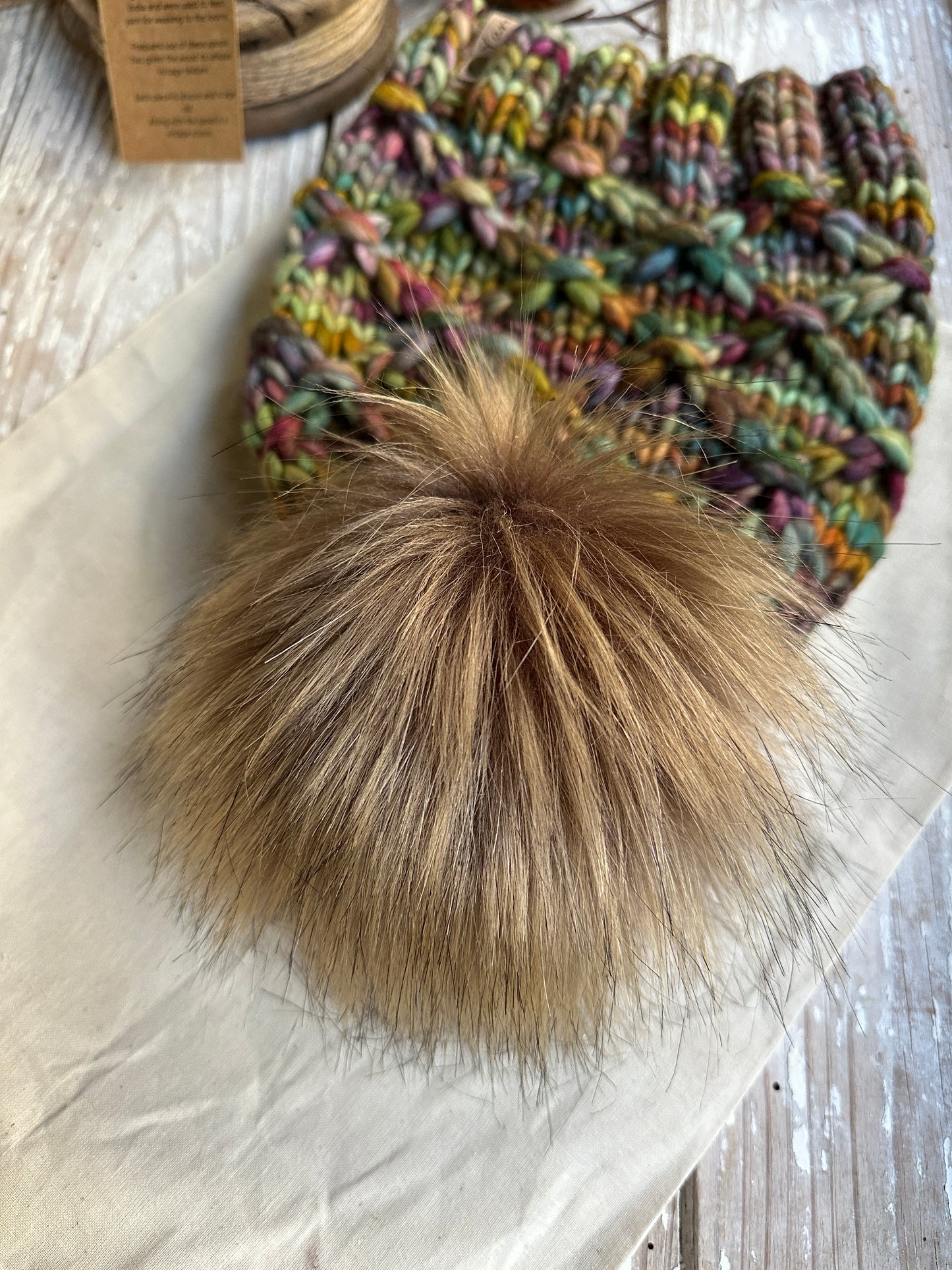 Merino wool knit hat with faux fur Pom