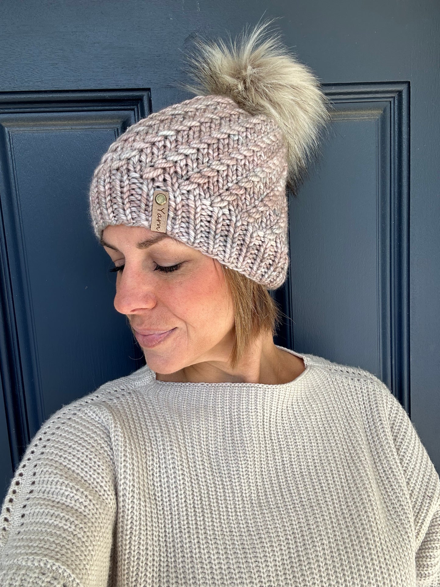 Merino wool knit hat with faux fur pom