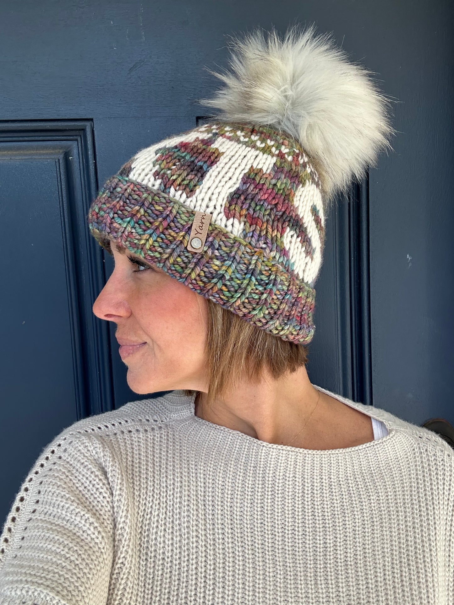 Merino wool knit hat with faux fur Pom