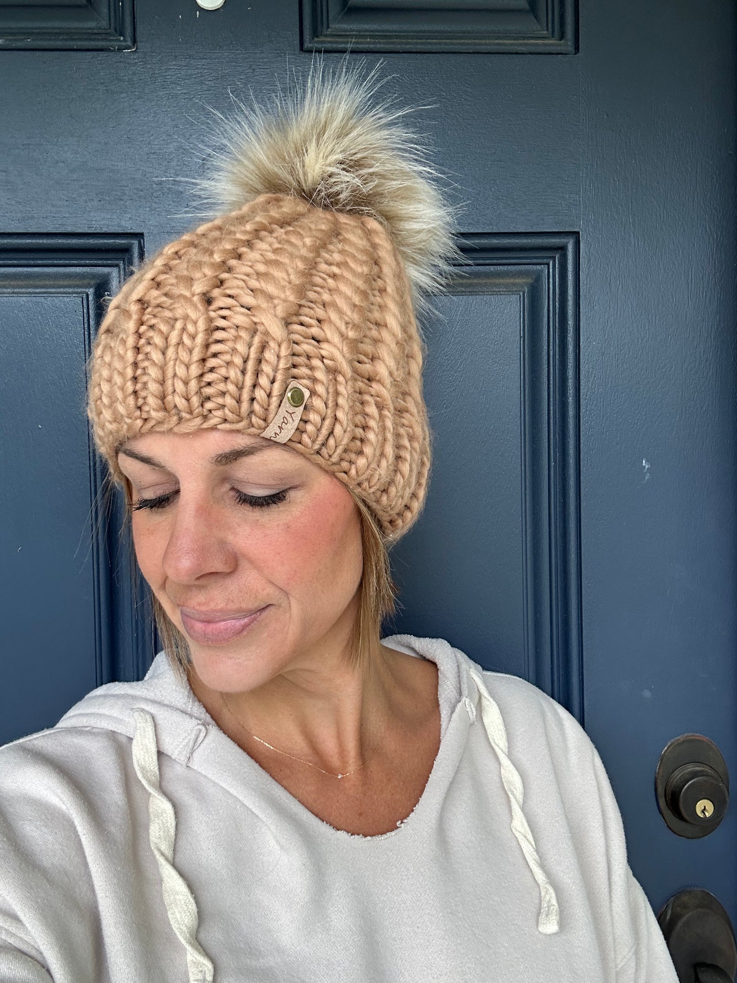 Merino wool knit hat with faux fur Pom