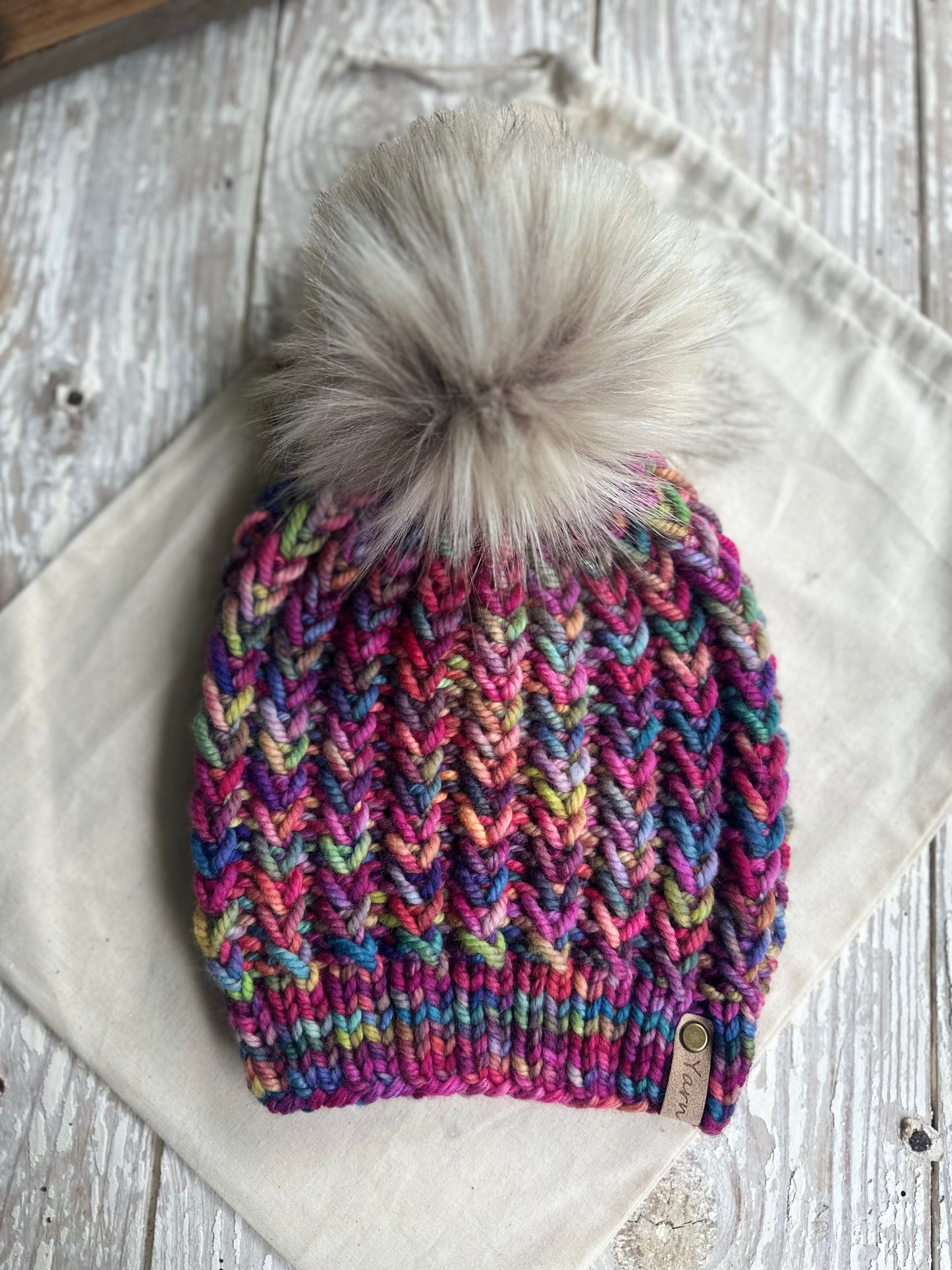 Merino wool knit hat with faux fur Pom