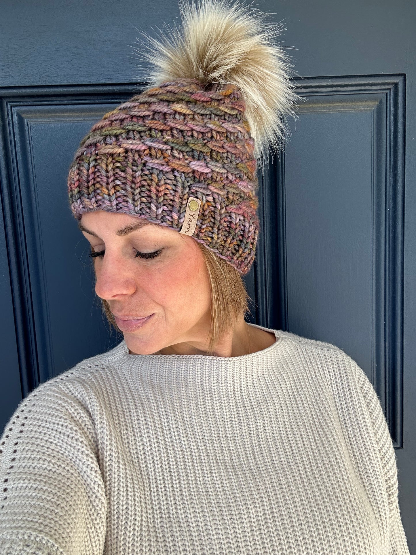 Merino wool knit hat with faux fur Pom