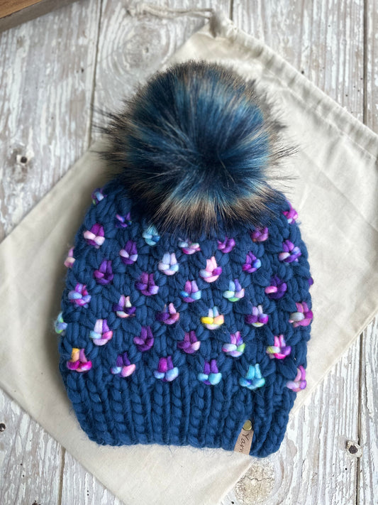 Merino wool knit hat with faux fur pom