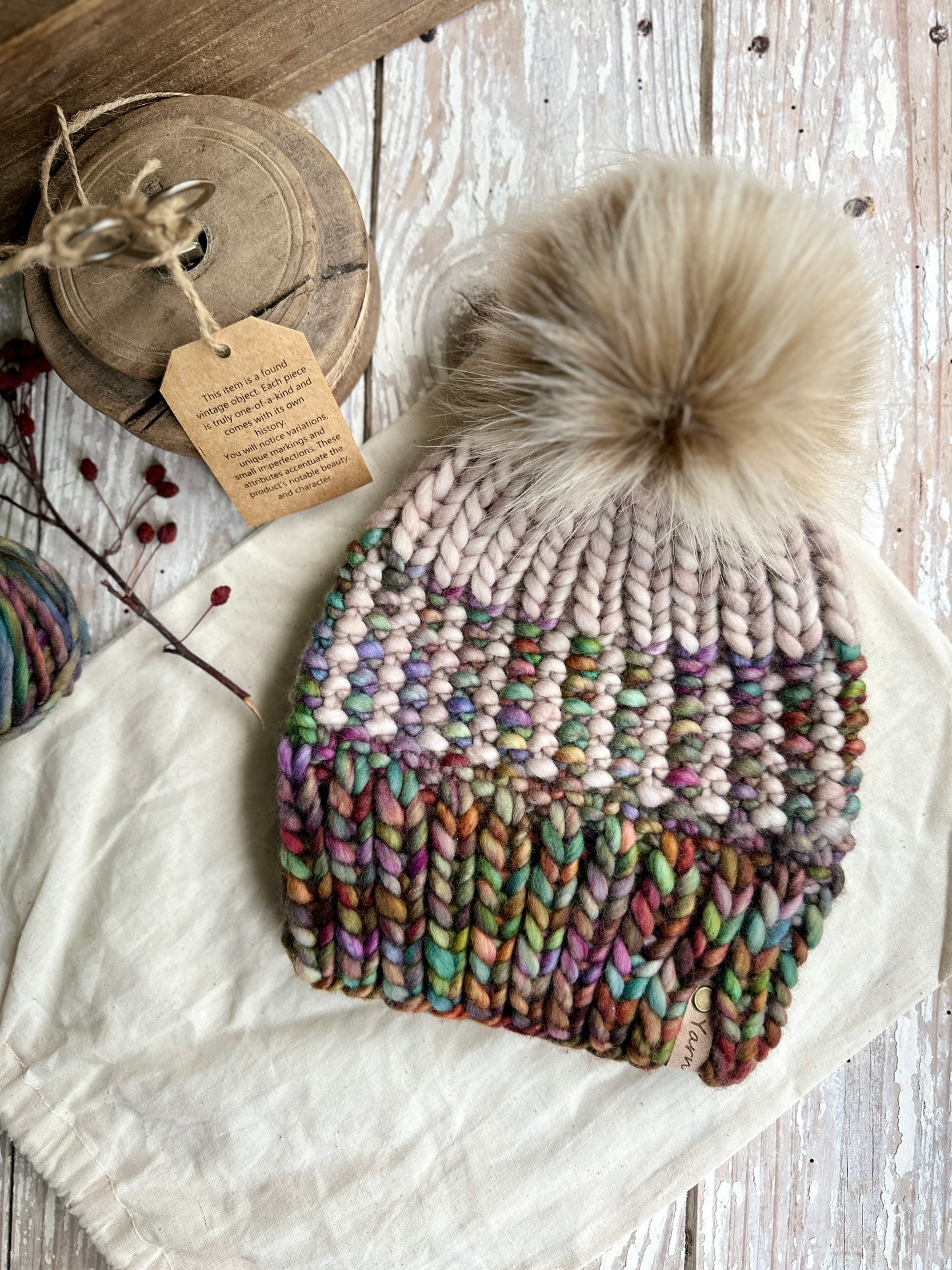 Merino wool knit hat with faux fur Pom