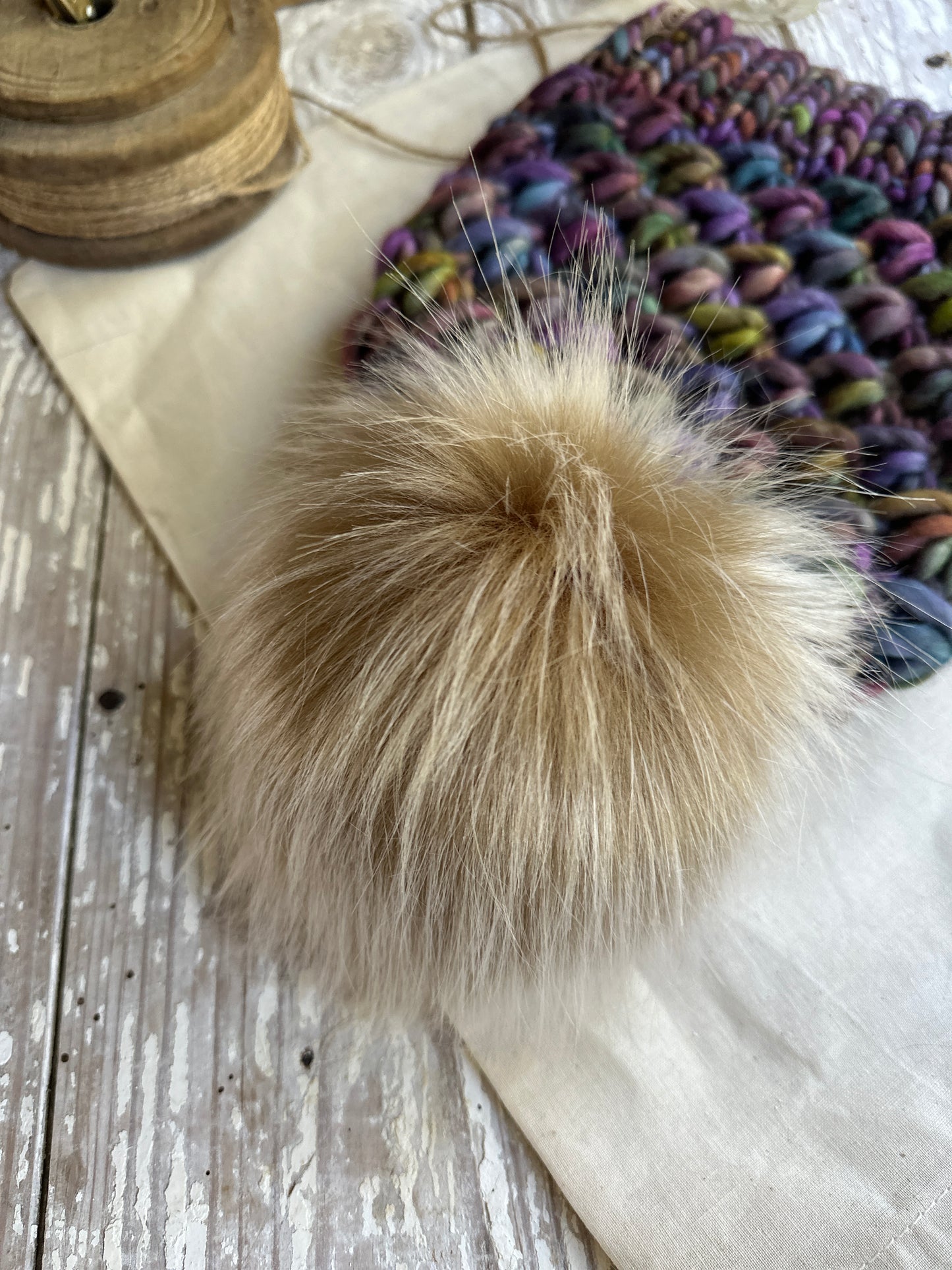 Merino wool knit hat with faux fur Pom