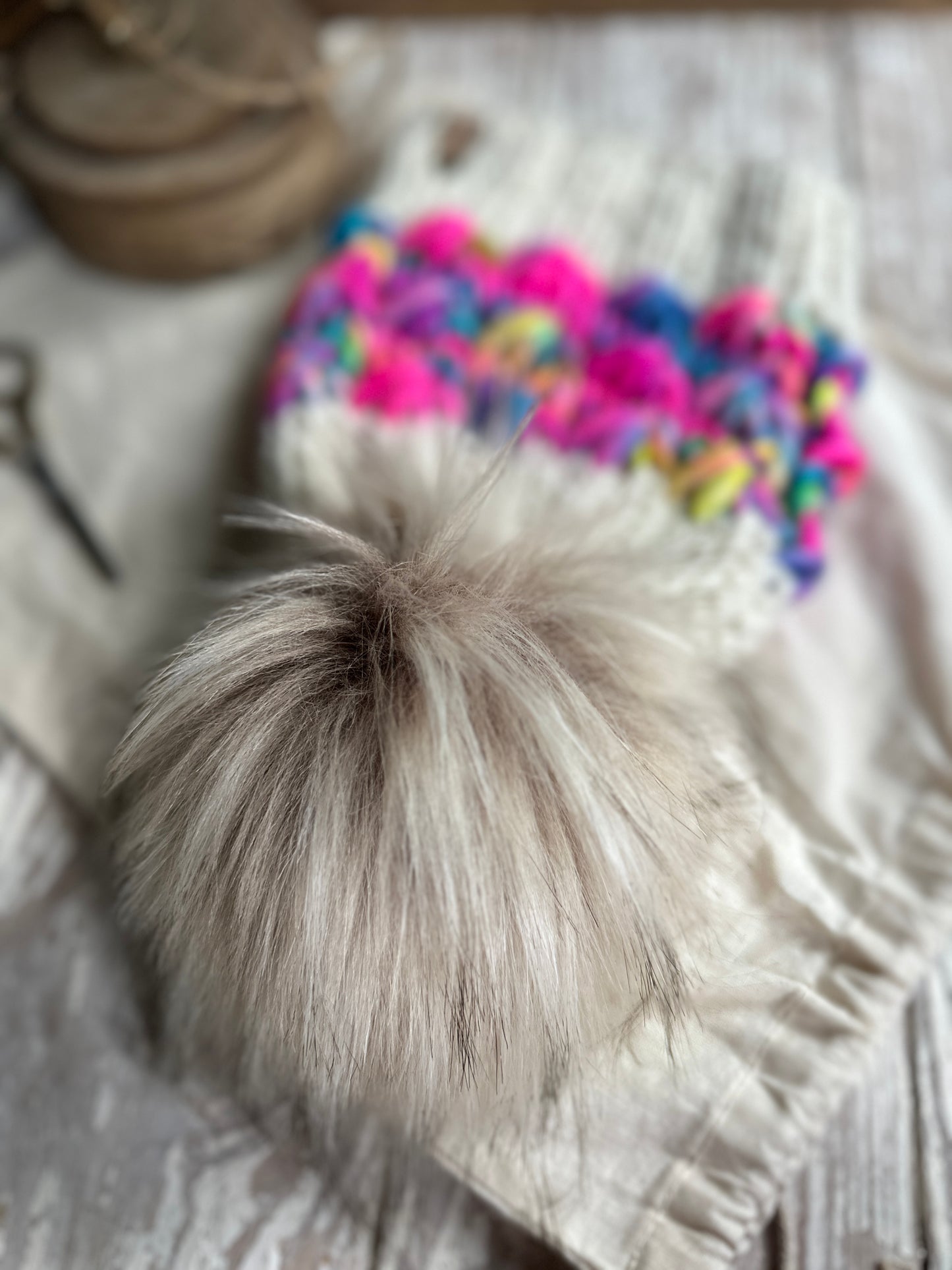 Merino wool knit hat with faux fur Pom