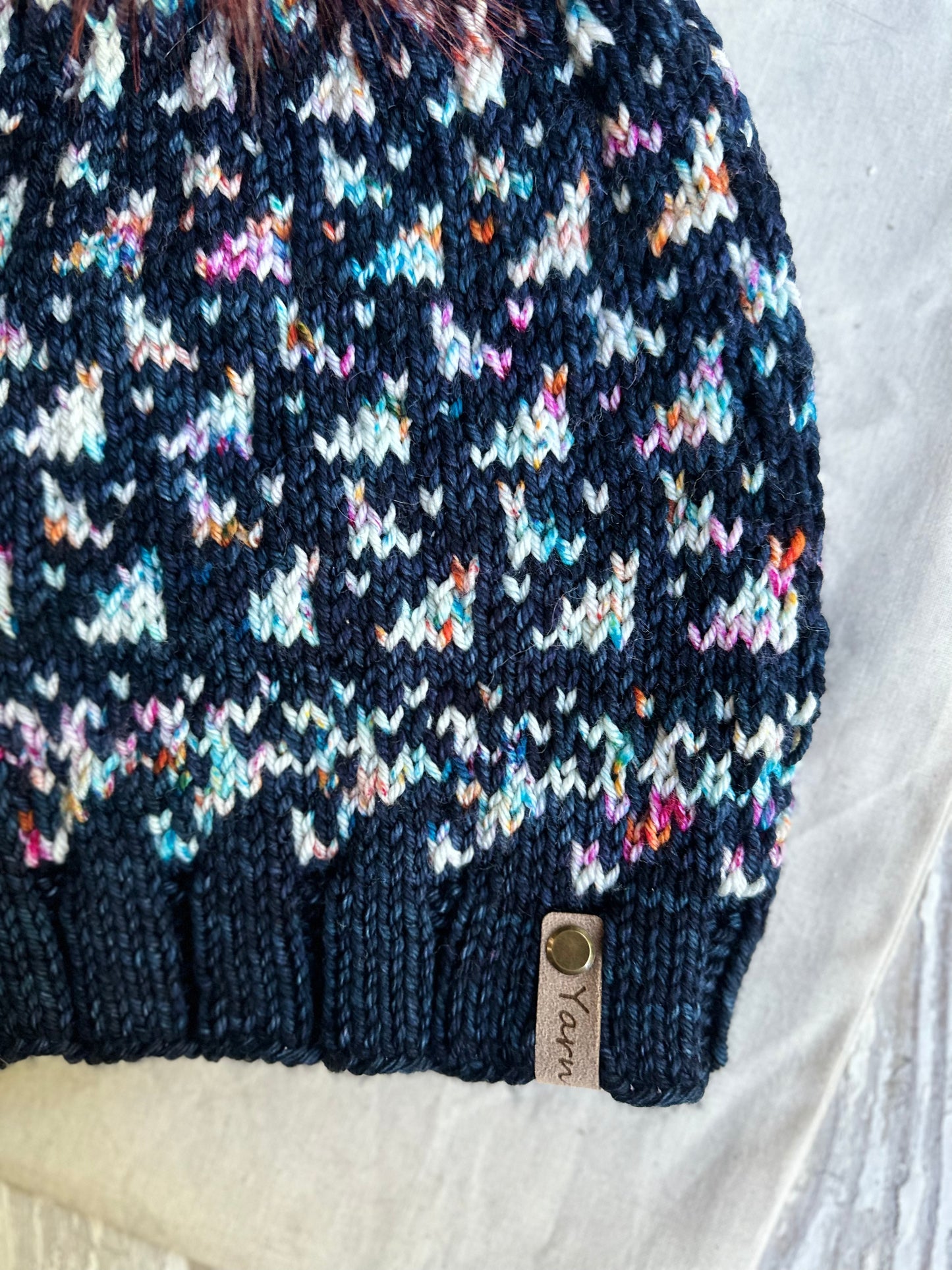 Merino wool knit hat with faux fur Pom