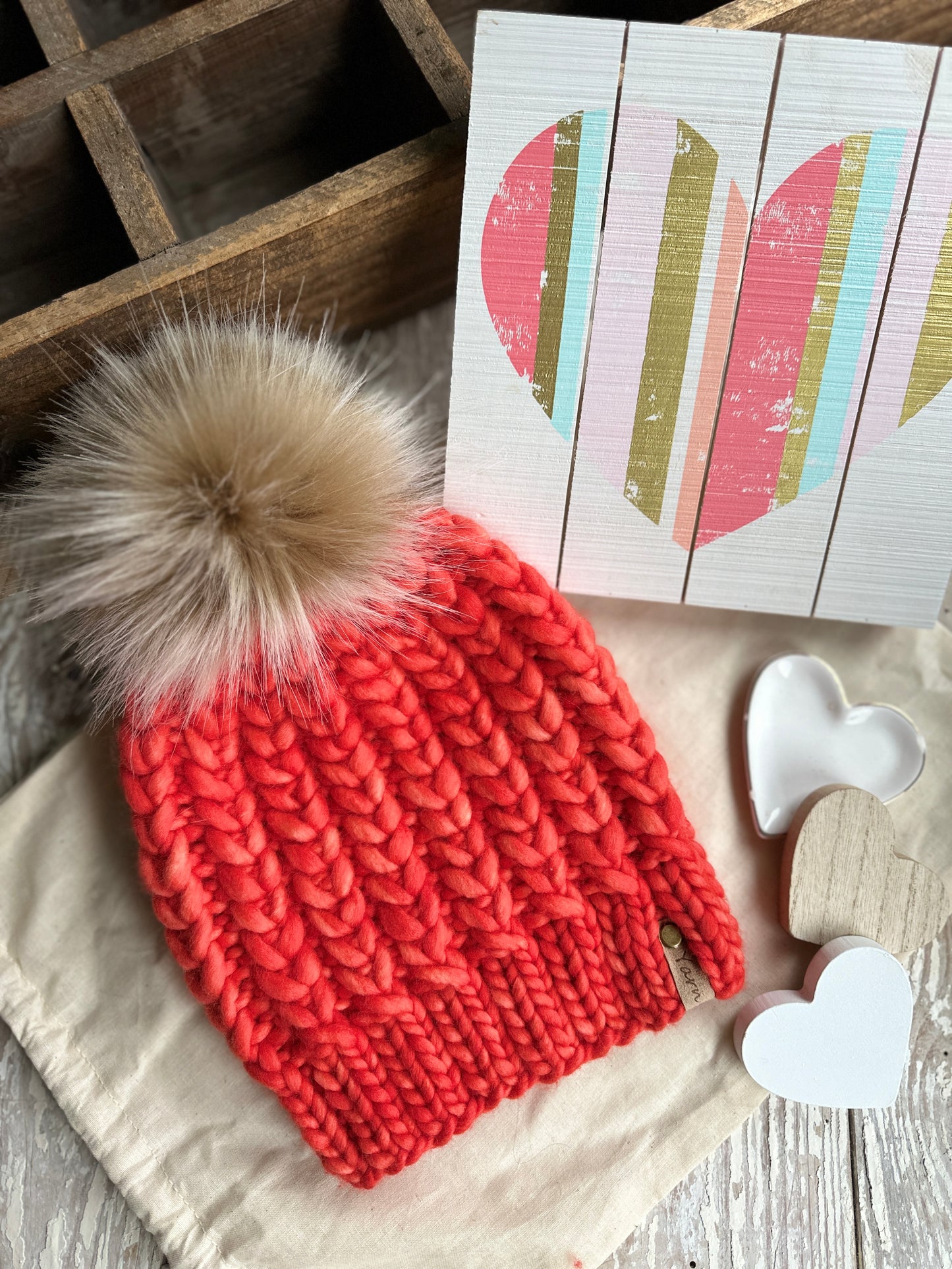 Merino wool knit hat with faux fur Pom