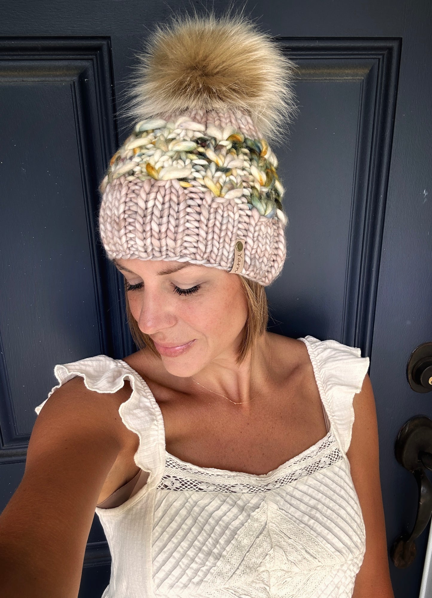 Merino wool knit hat with faux fur Pom