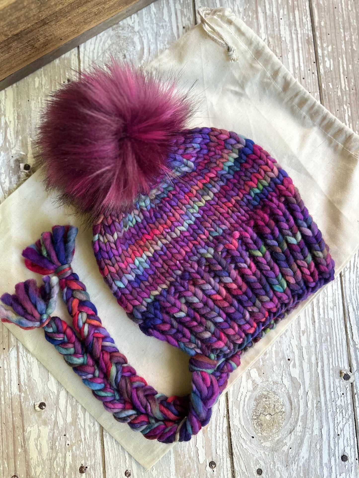 Merino wool split brim beanie with faux fur pom