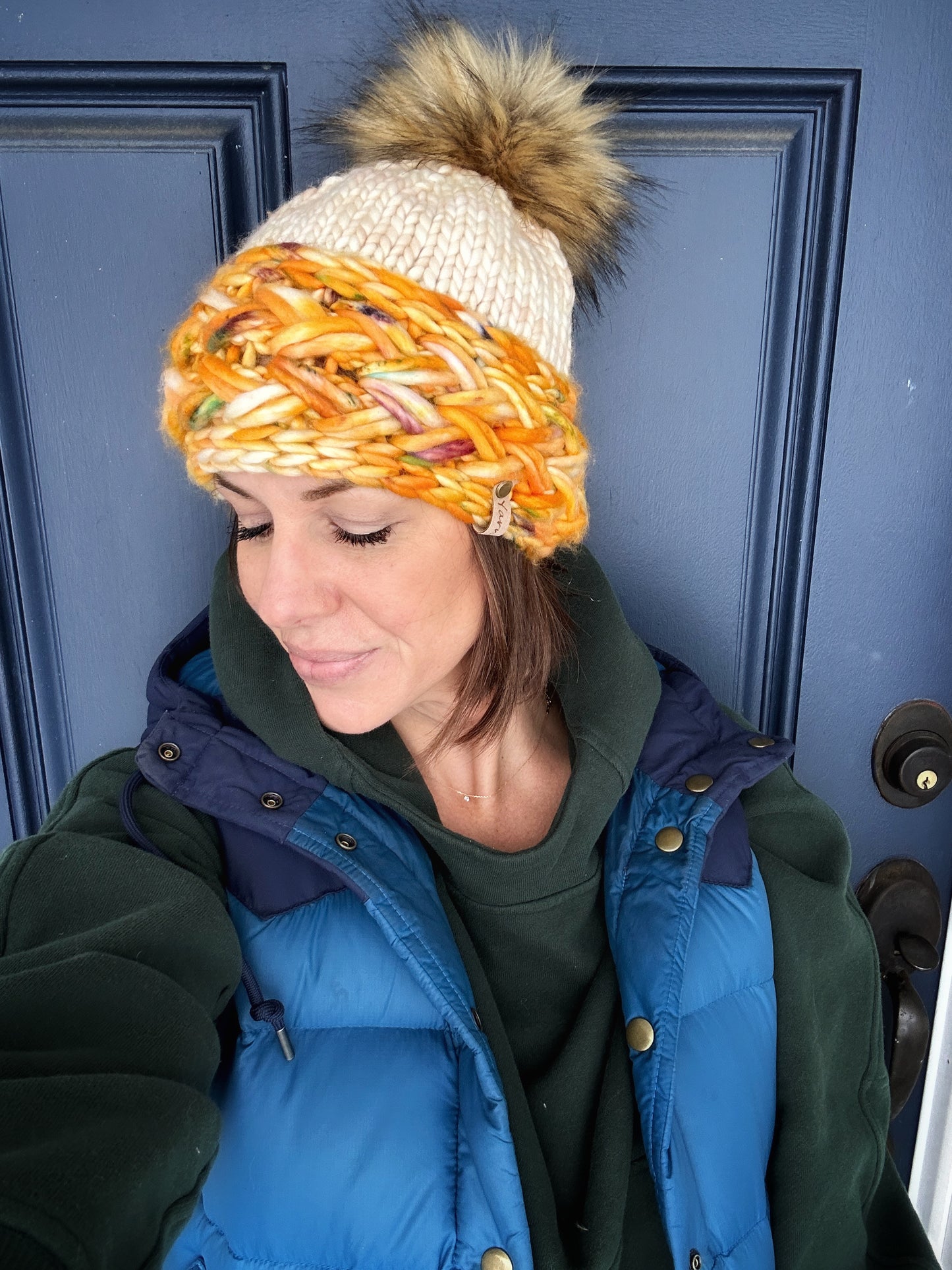 Merino wool knit hat with faux fur Pom