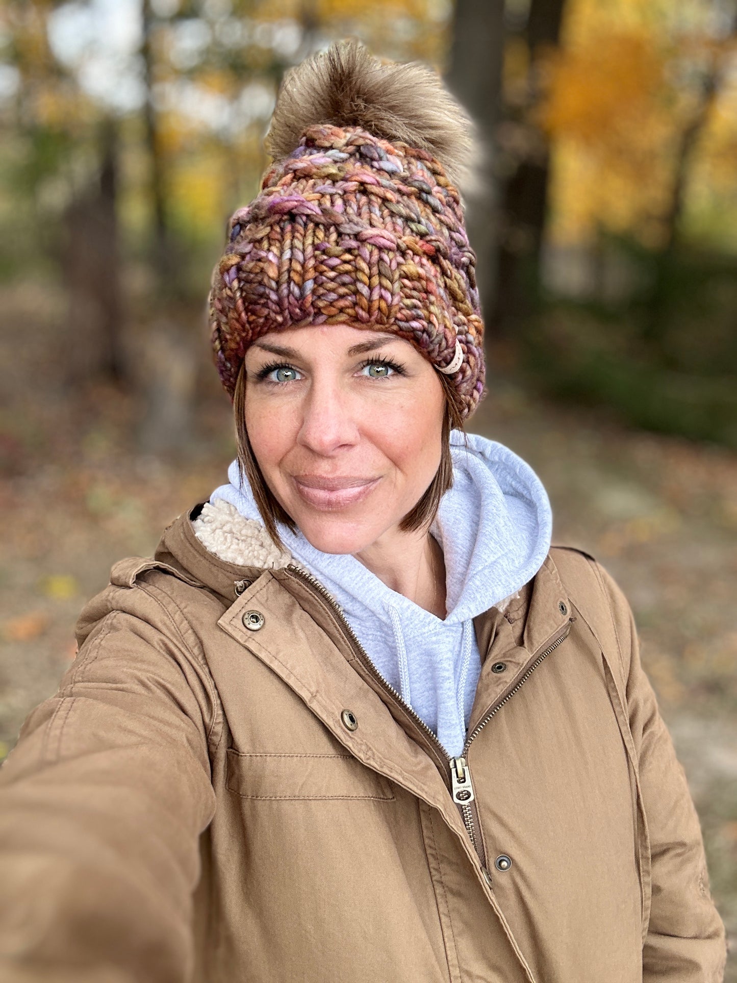 Merino wool knit headband with faux fur Pom