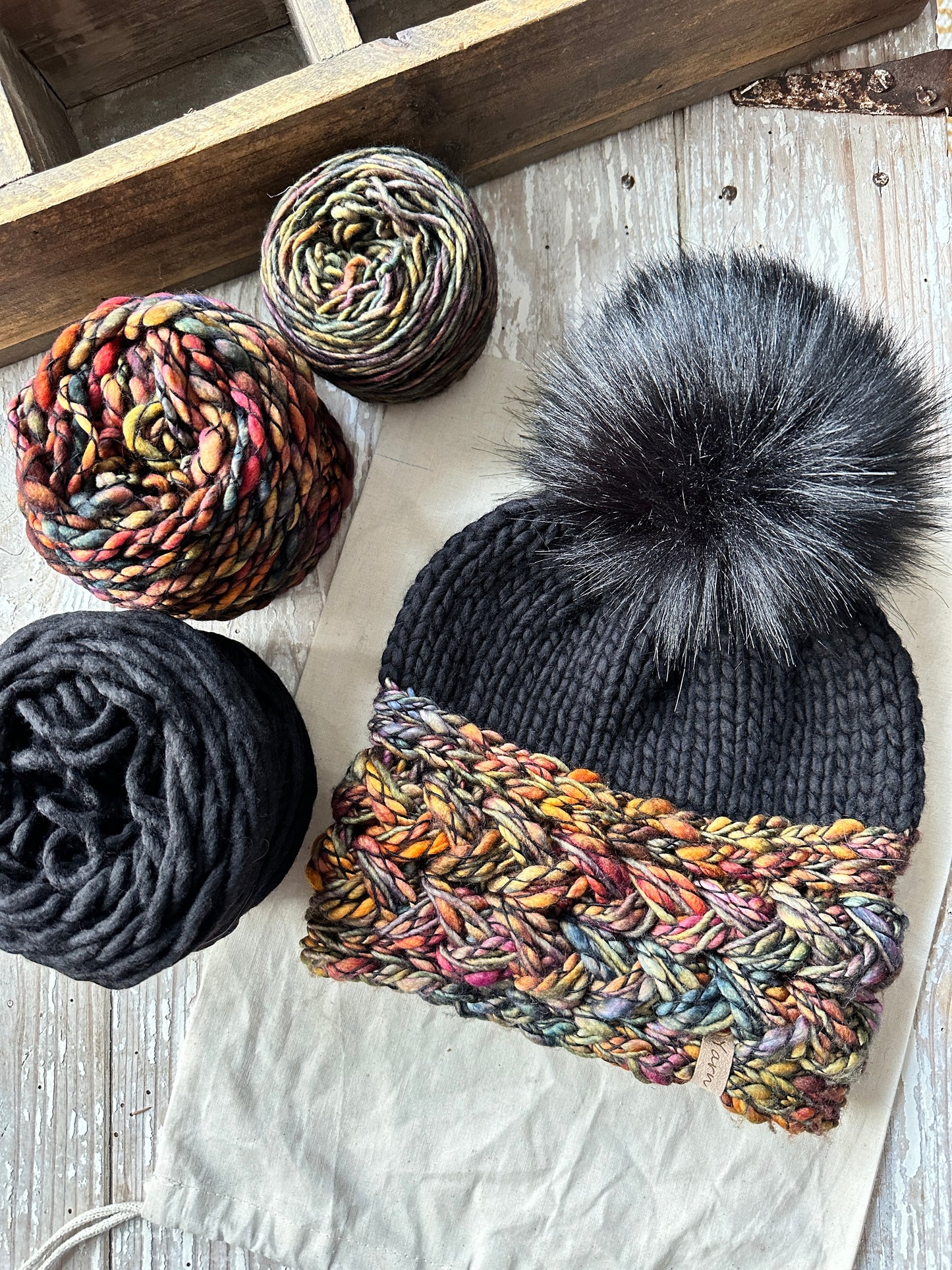 Merino wool knit hat with faux fur Pom