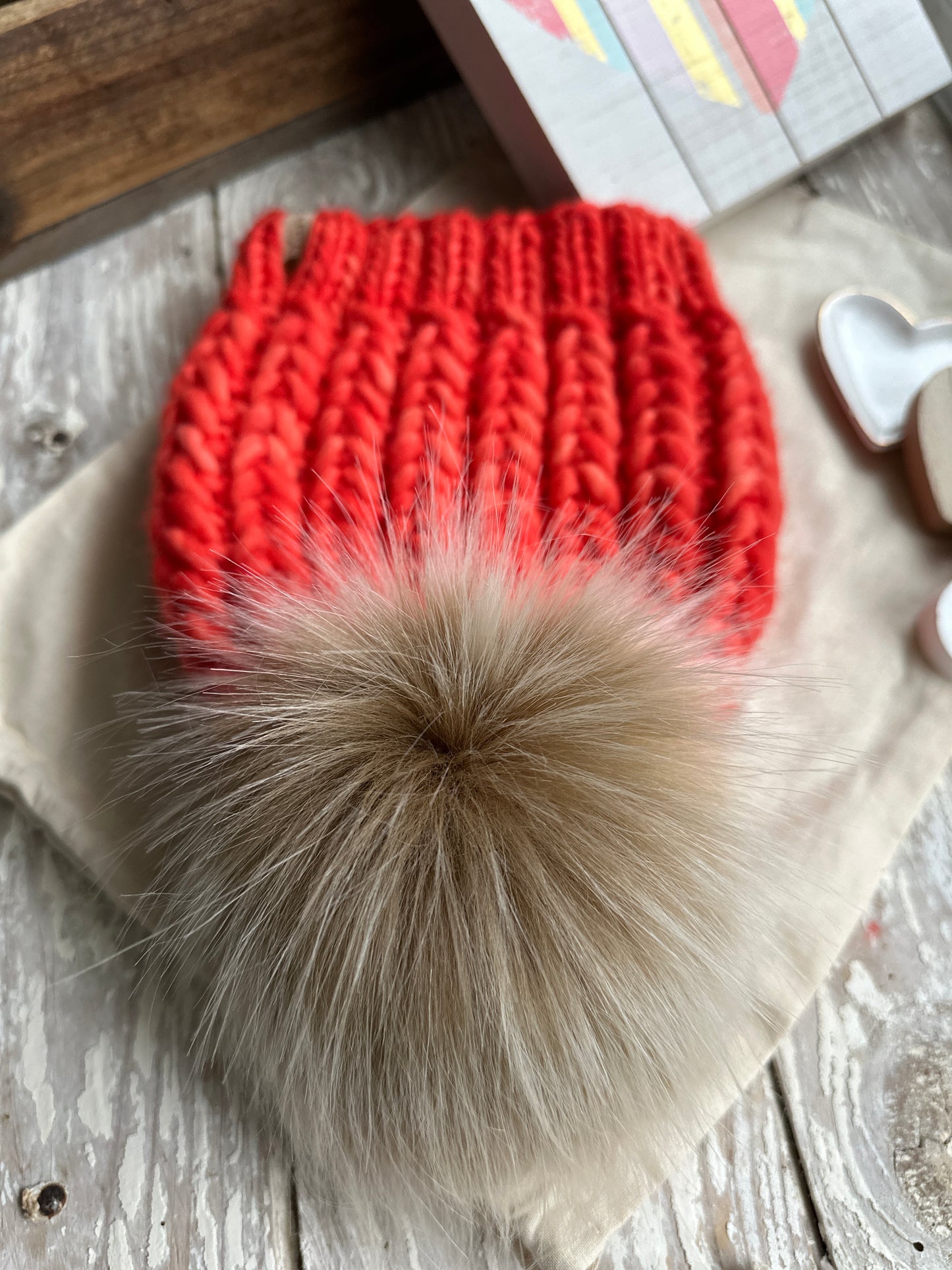 Merino wool knit hat with faux fur Pom