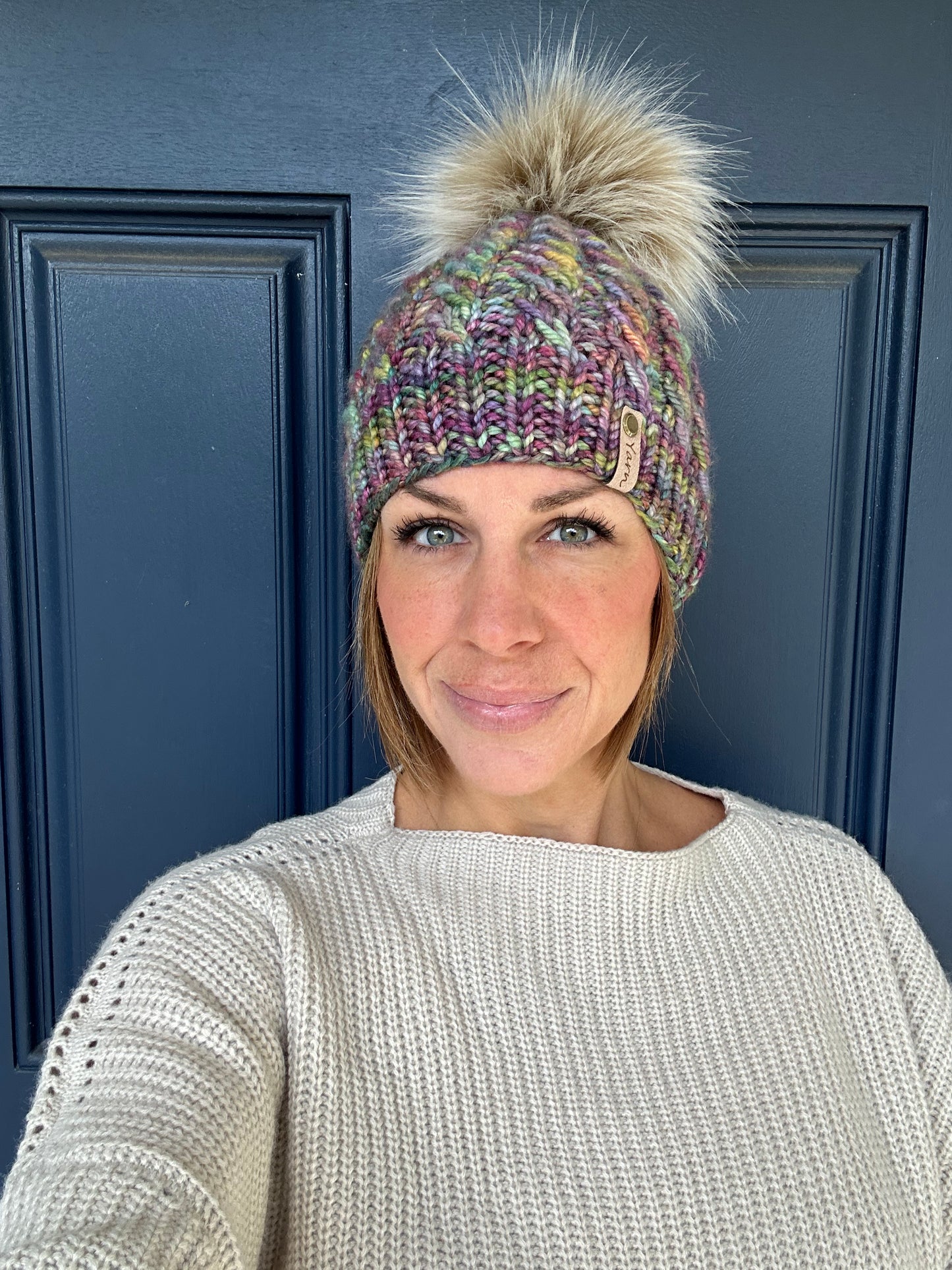 Merino wool knit hat with faux fur Pom