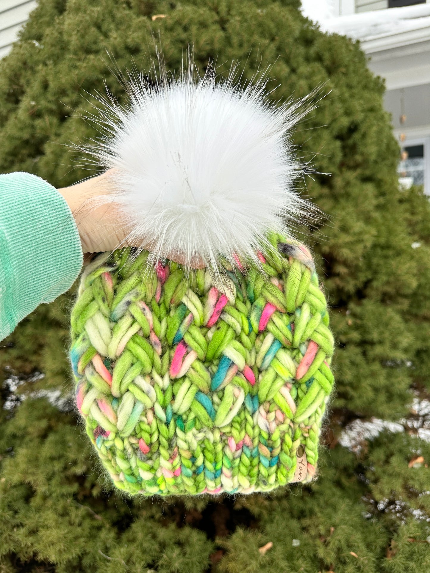 Merino wool knit hat with faux fur Pom