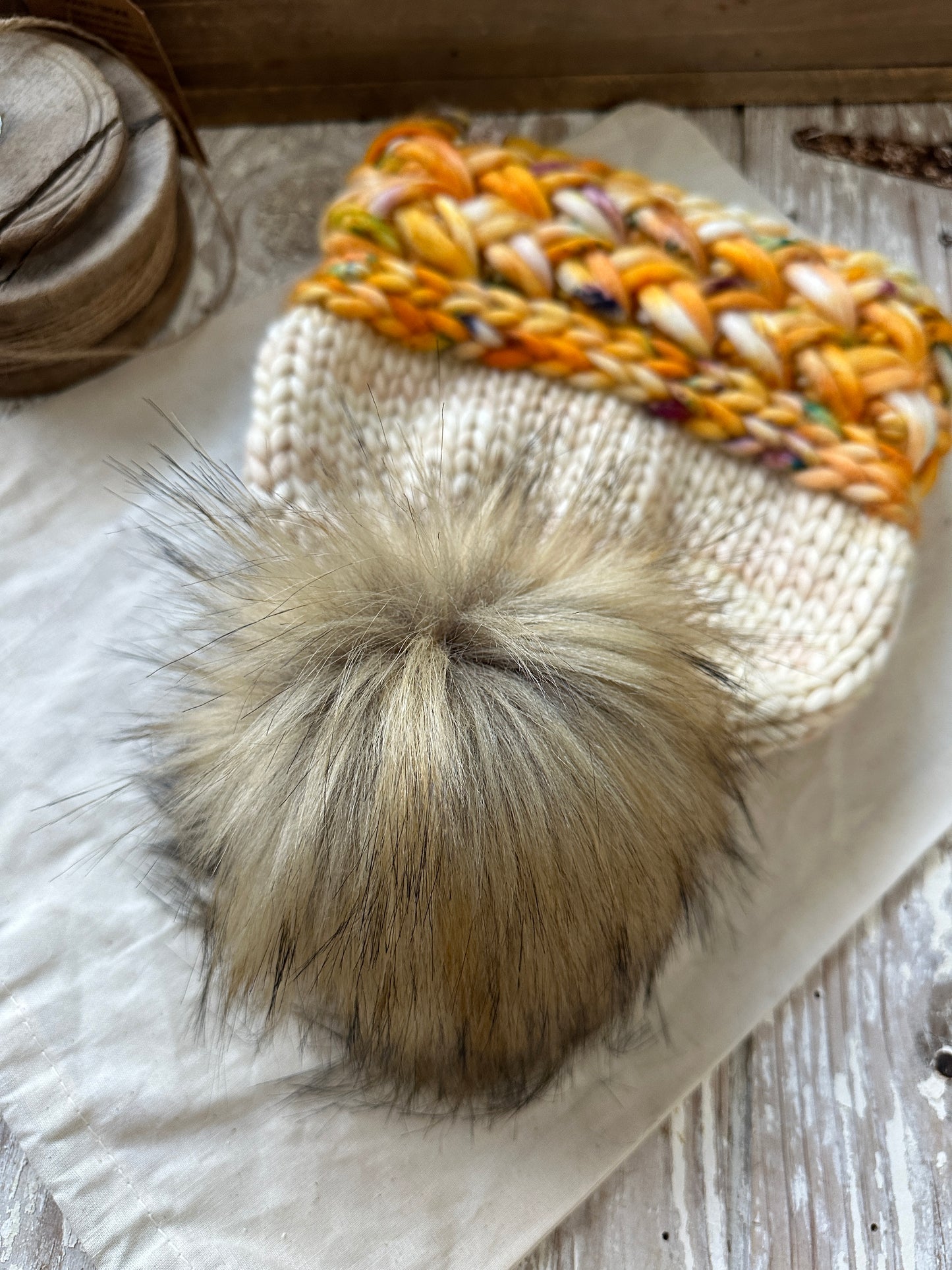 Merino wool knit hat with faux fur Pom