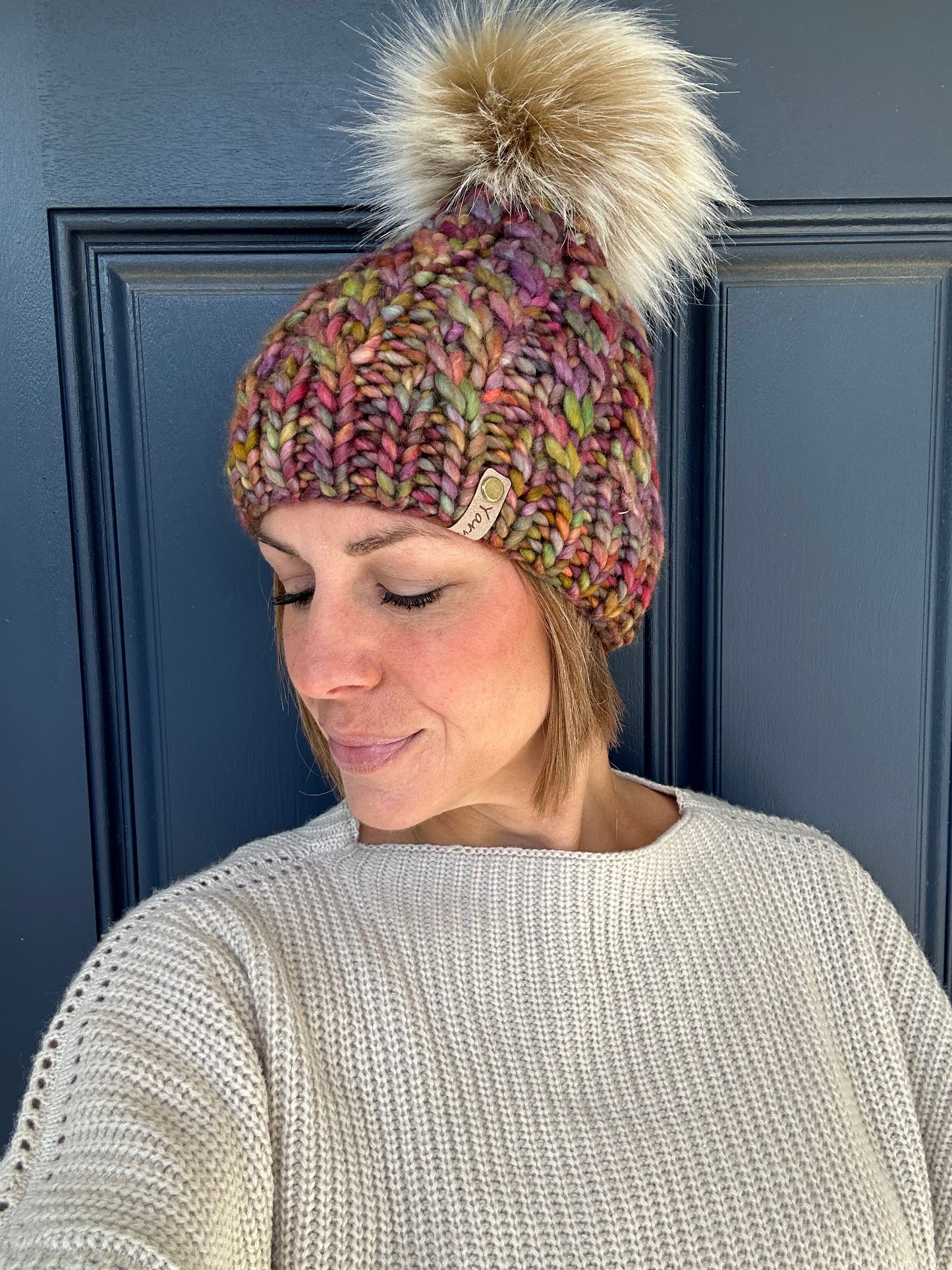 Merino wool knit hat with faux fur Pom