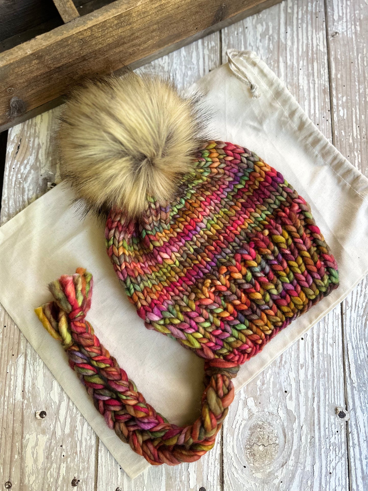 Merino wool split brim beanie with faux fur pom