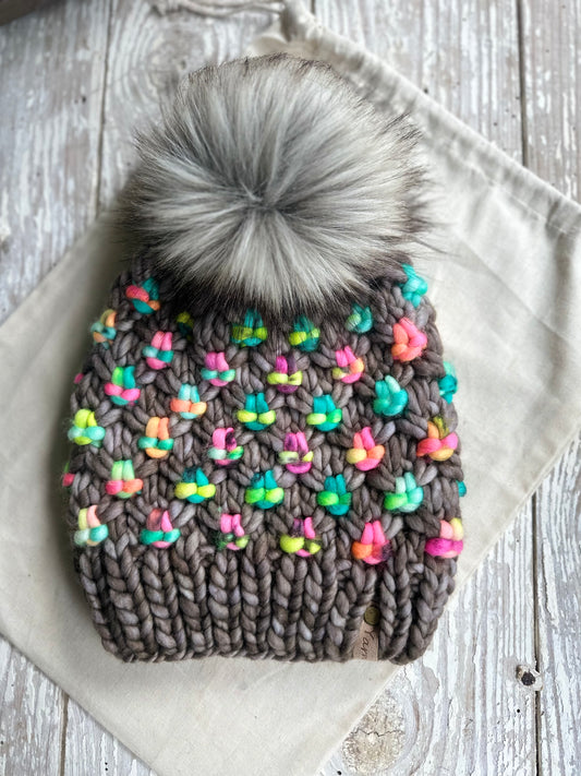 Merino wool knit hat with faux fur pom