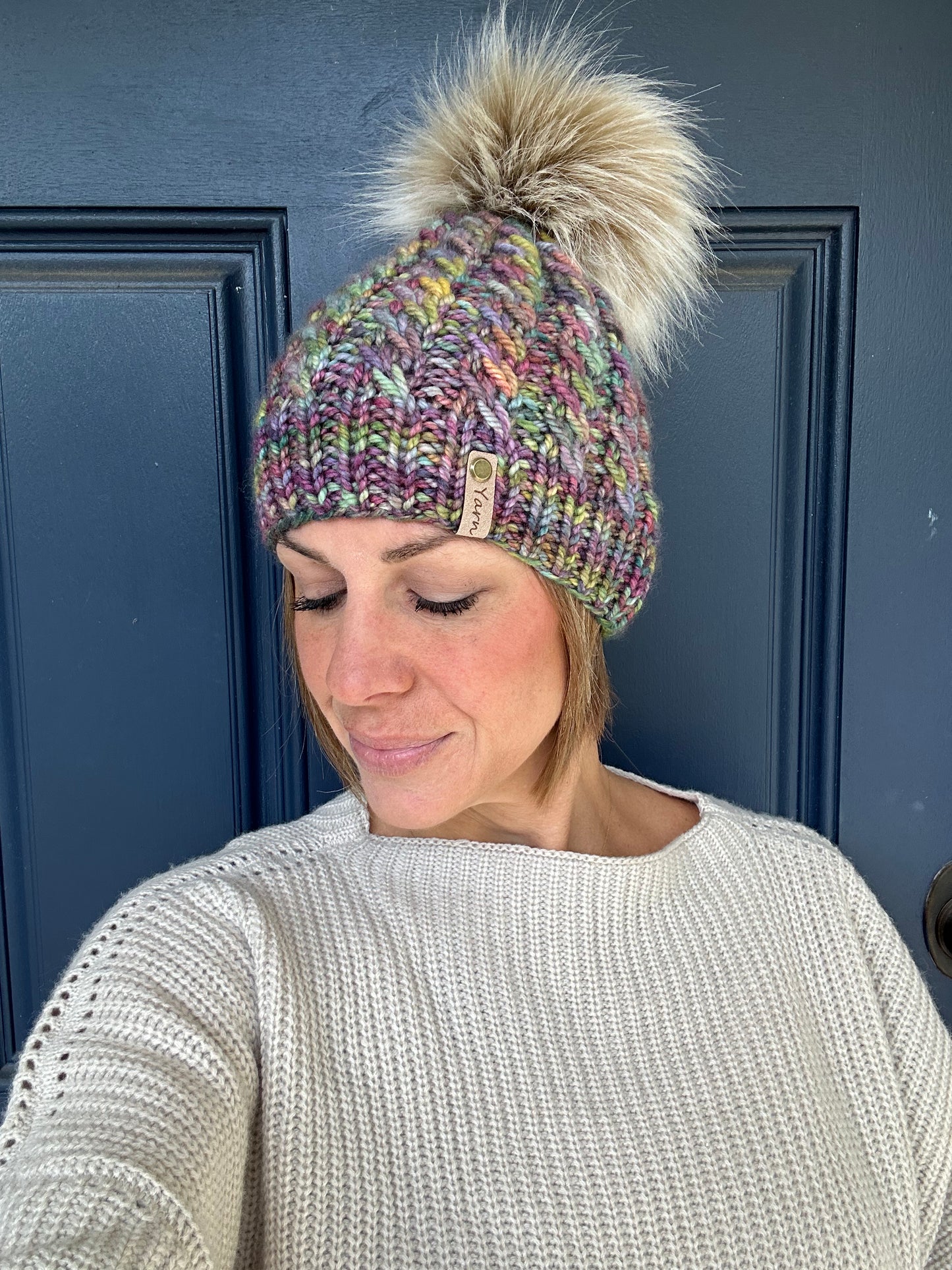 Merino wool knit hat with faux fur Pom