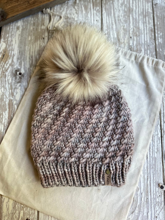 Merino wool knit hat with faux fur pom