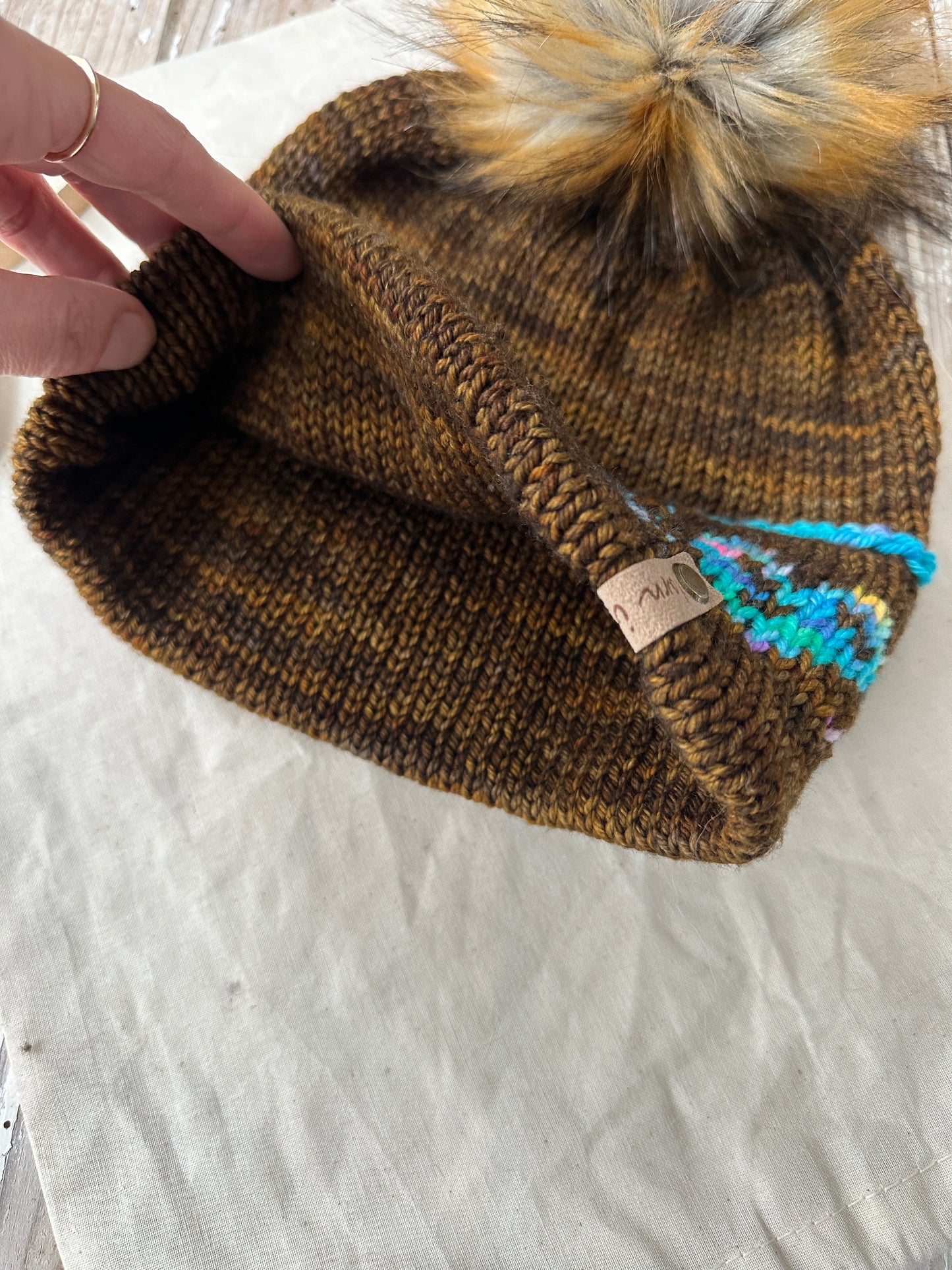 Merino wool knit hat with faux fur Pom