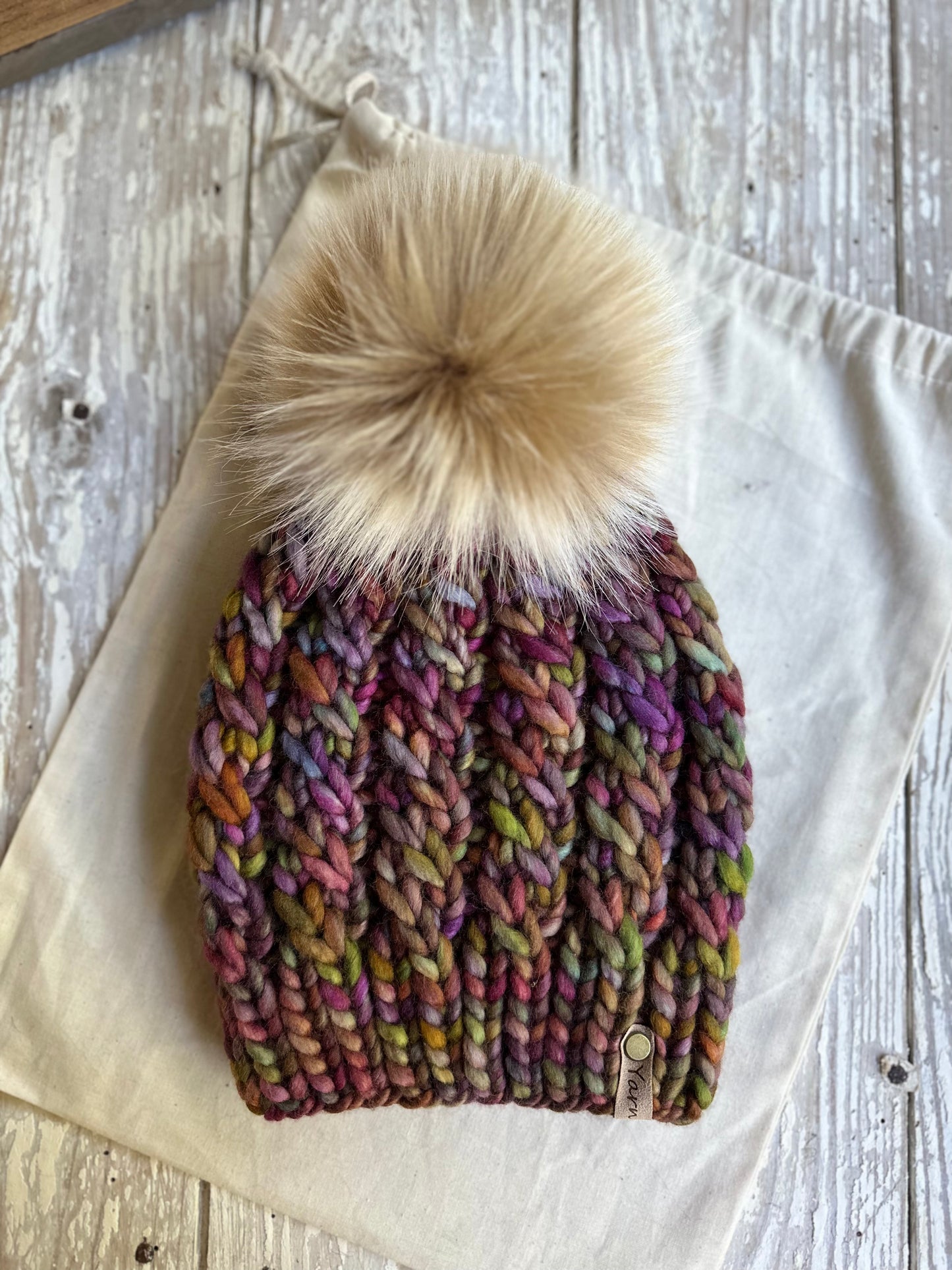 Merino wool knit hat with faux fur Pom