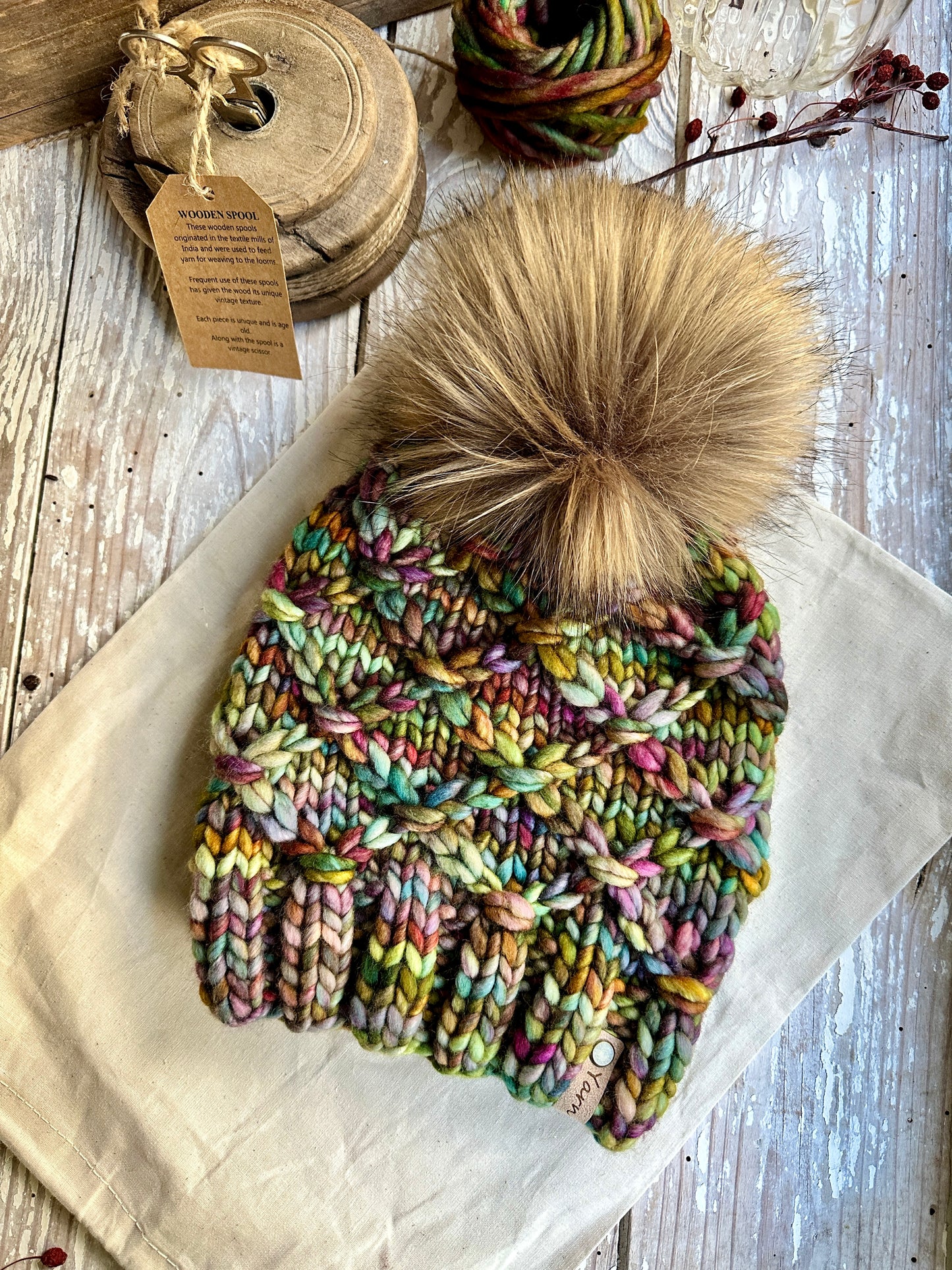 Merino wool knit hat with faux fur Pom