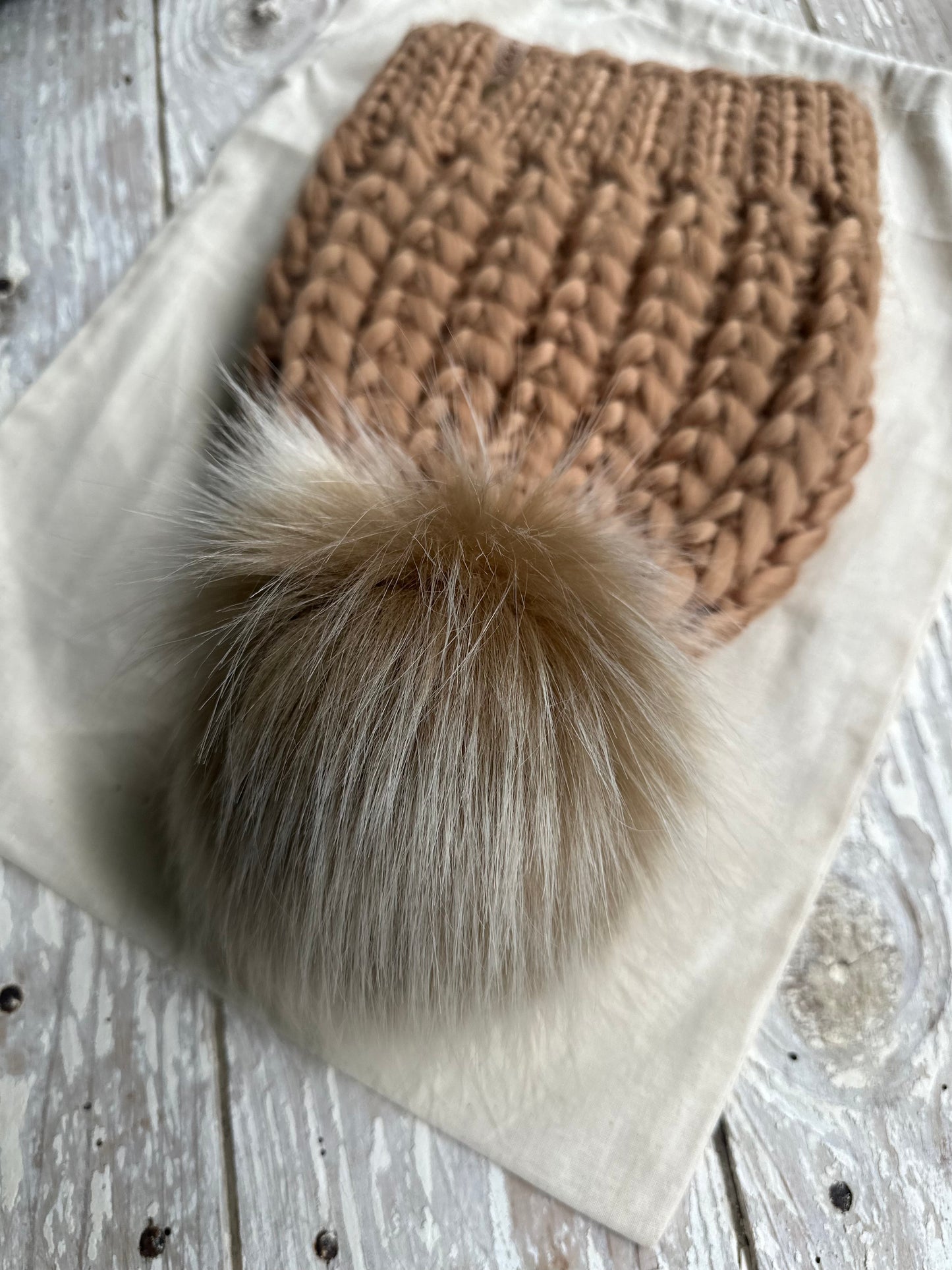 Merino wool knit hat with faux fur Pom