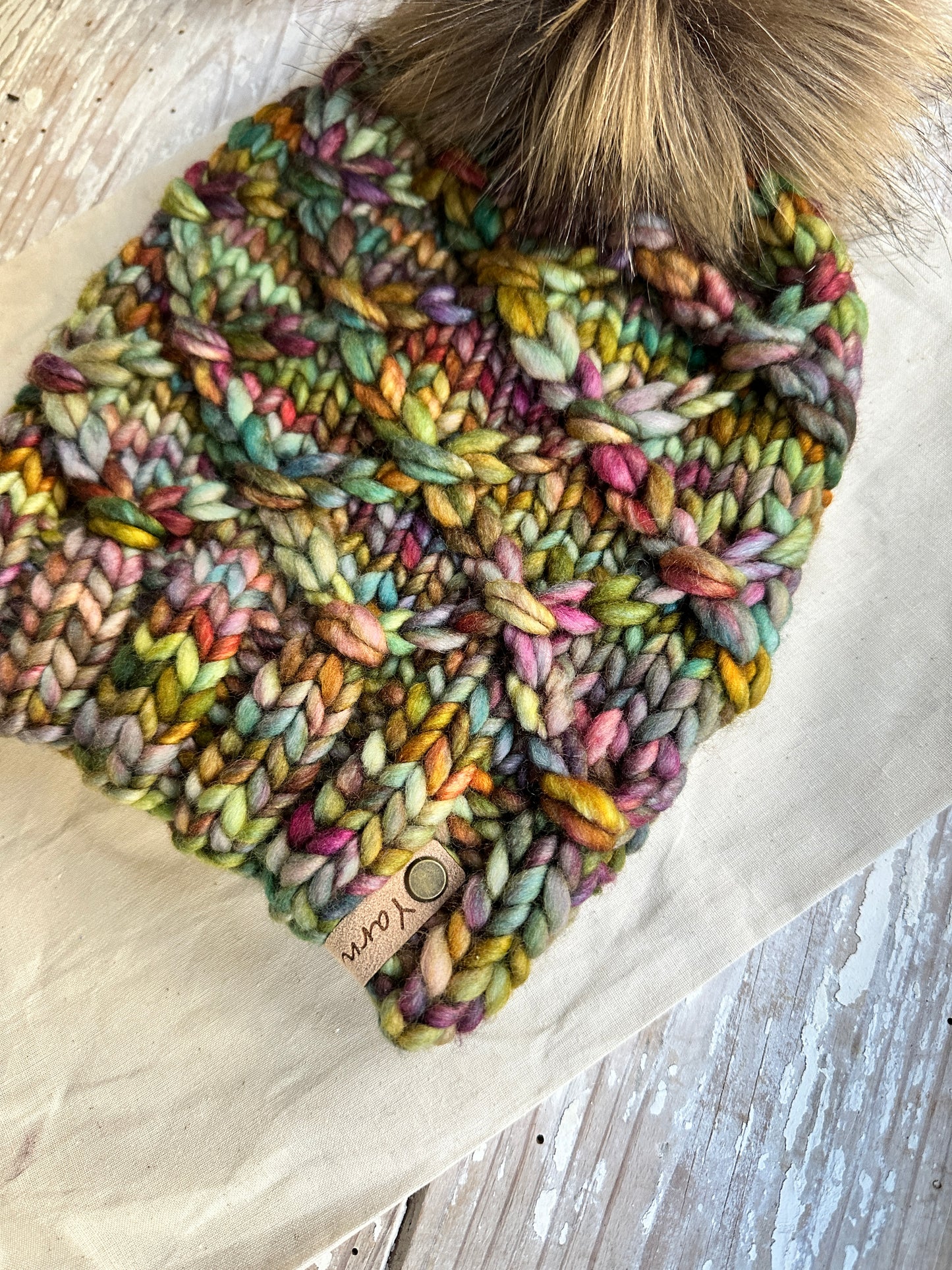 Merino wool knit hat with faux fur Pom