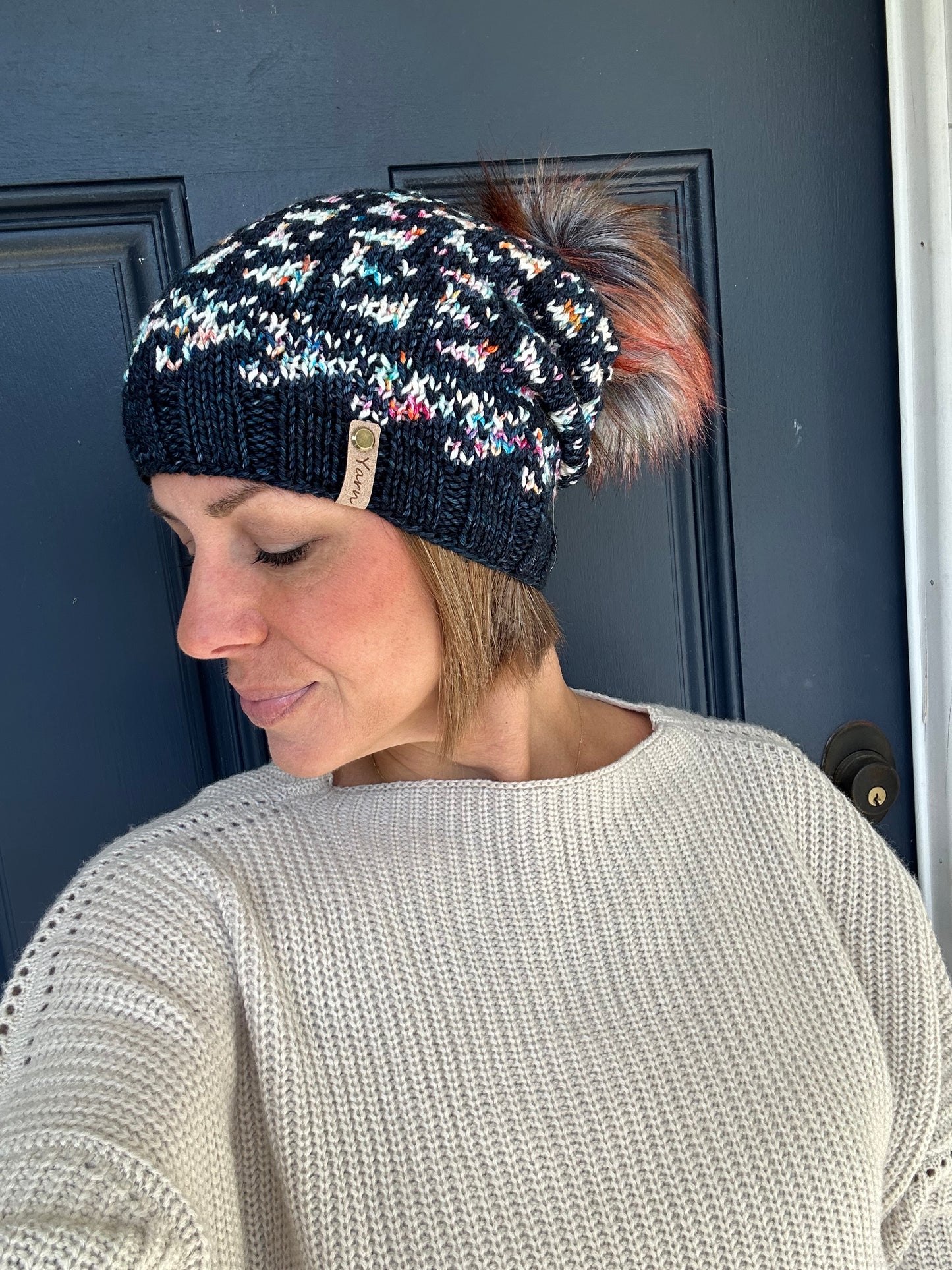 Merino wool knit hat with faux fur Pom