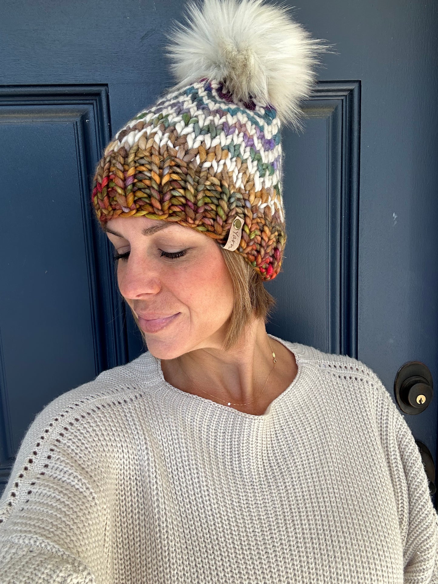 Merino wool knit hat with faux fur Pom