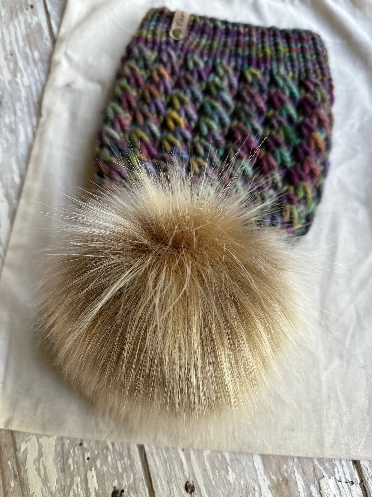 Merino wool knit hat with faux fur Pom