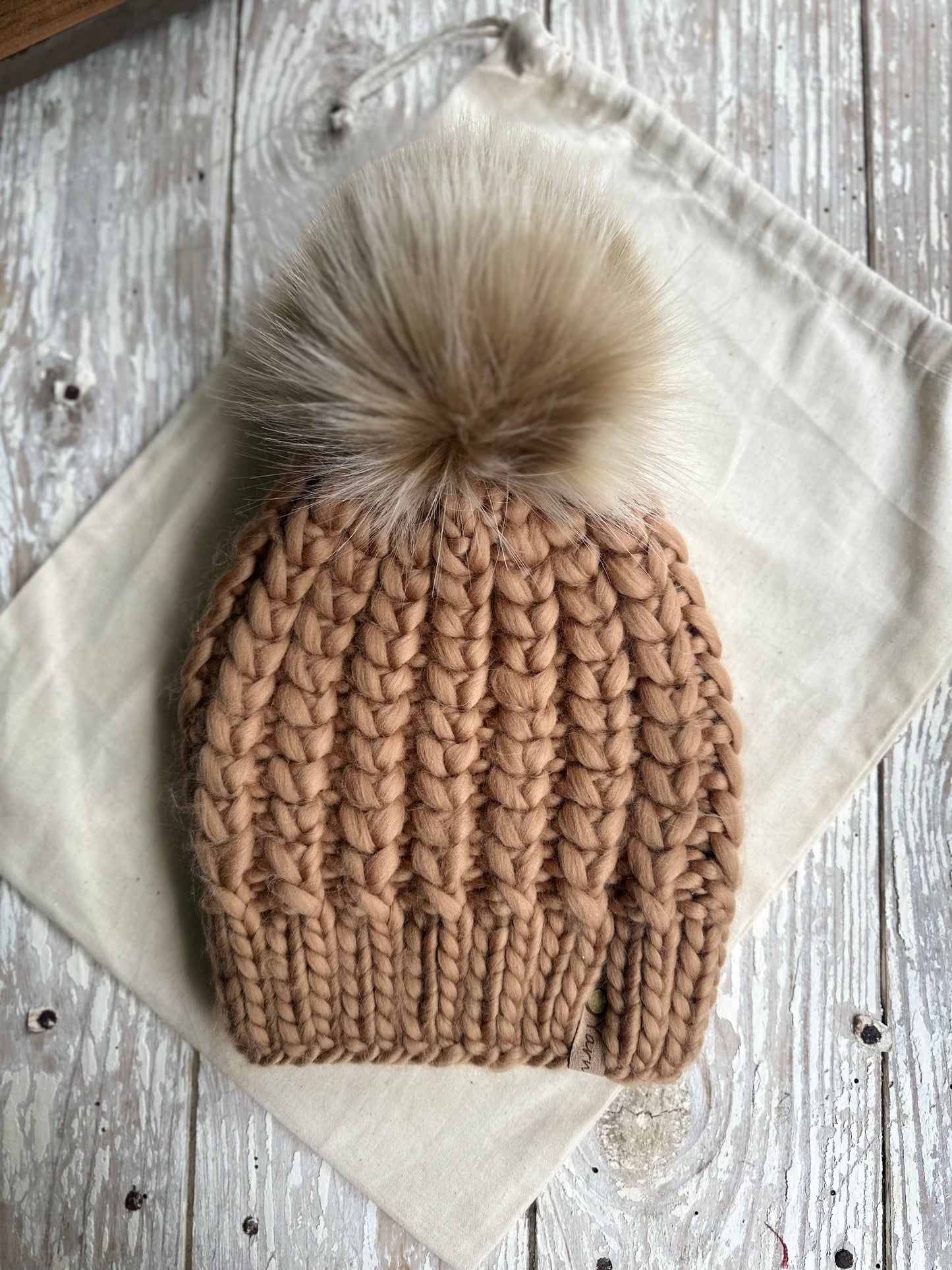 Merino wool knit hat with faux fur Pom