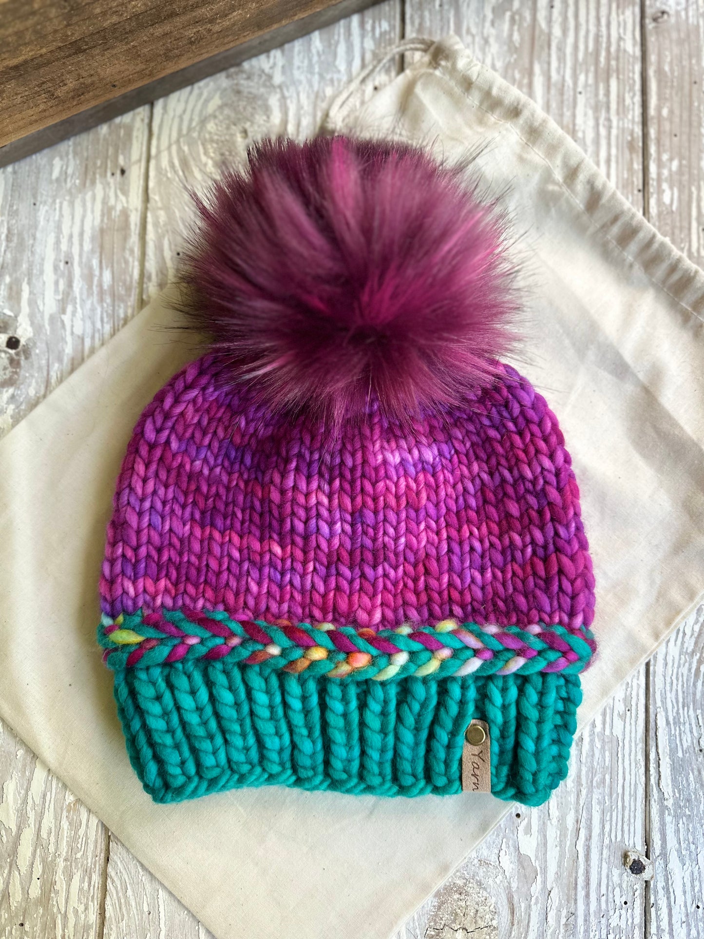 Merino wool knit hat with faux fur Pom