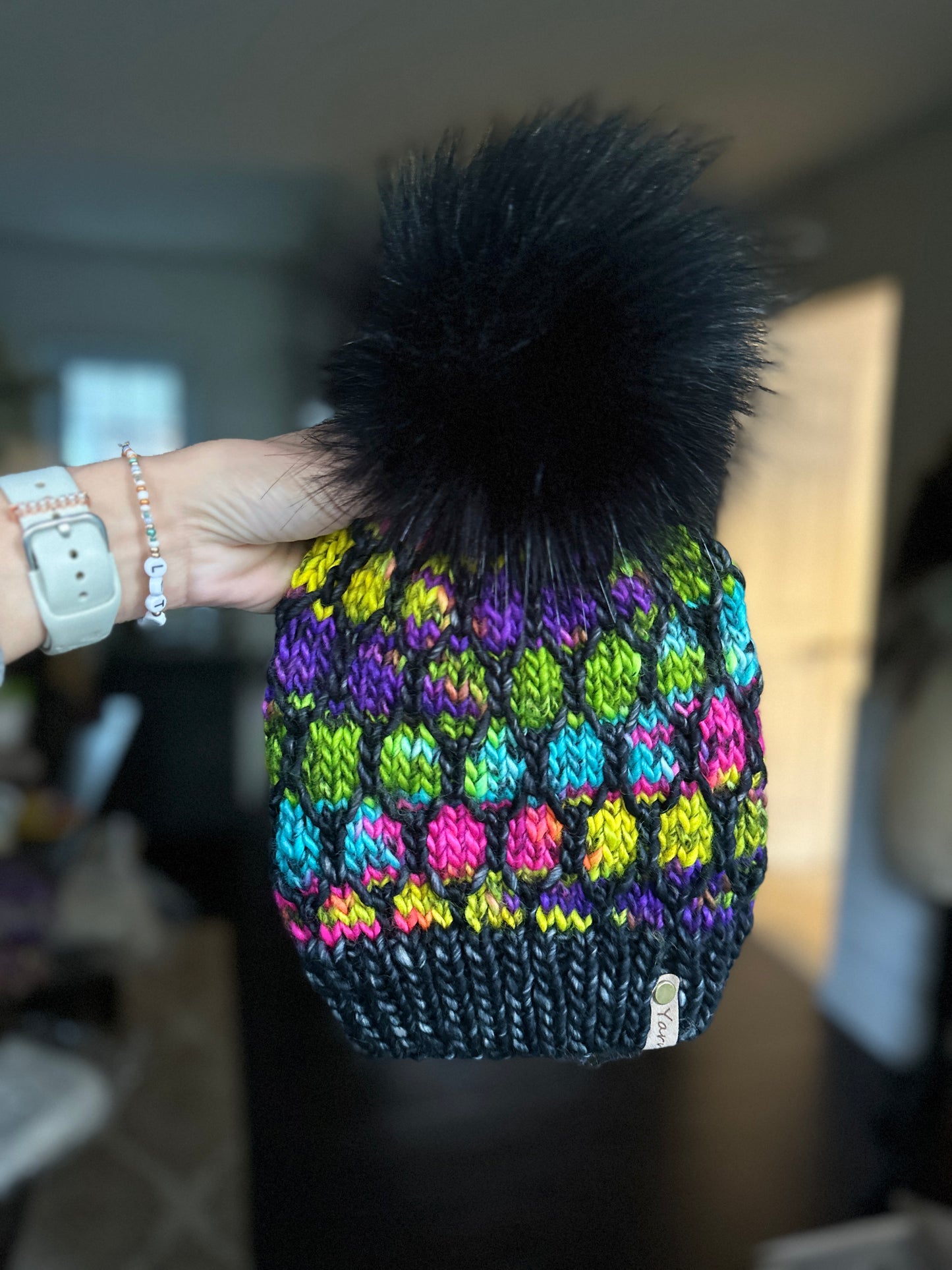 Merino wool knit hat with faux fur pom