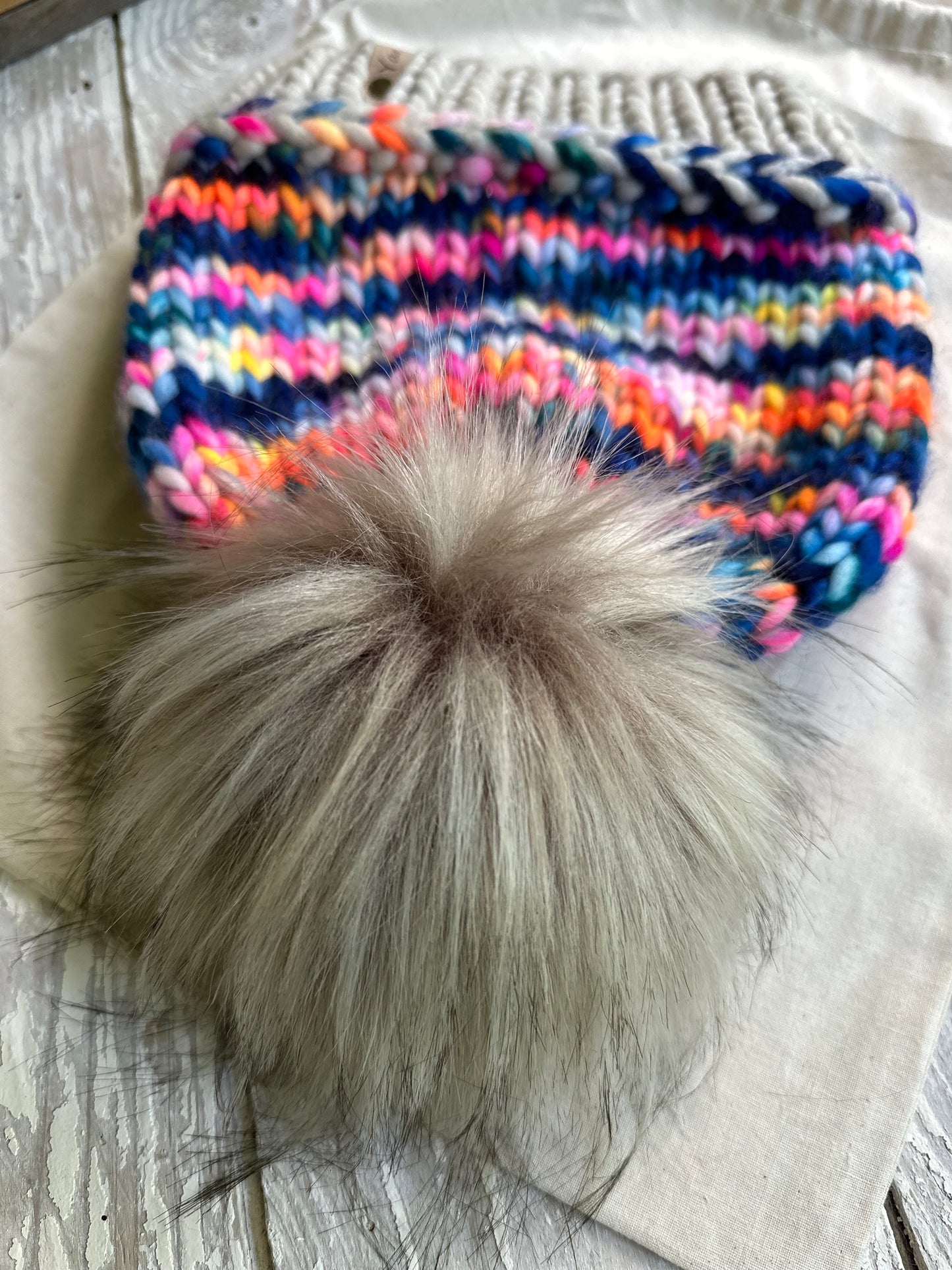 Merino wool knit hat with faux fur Pom