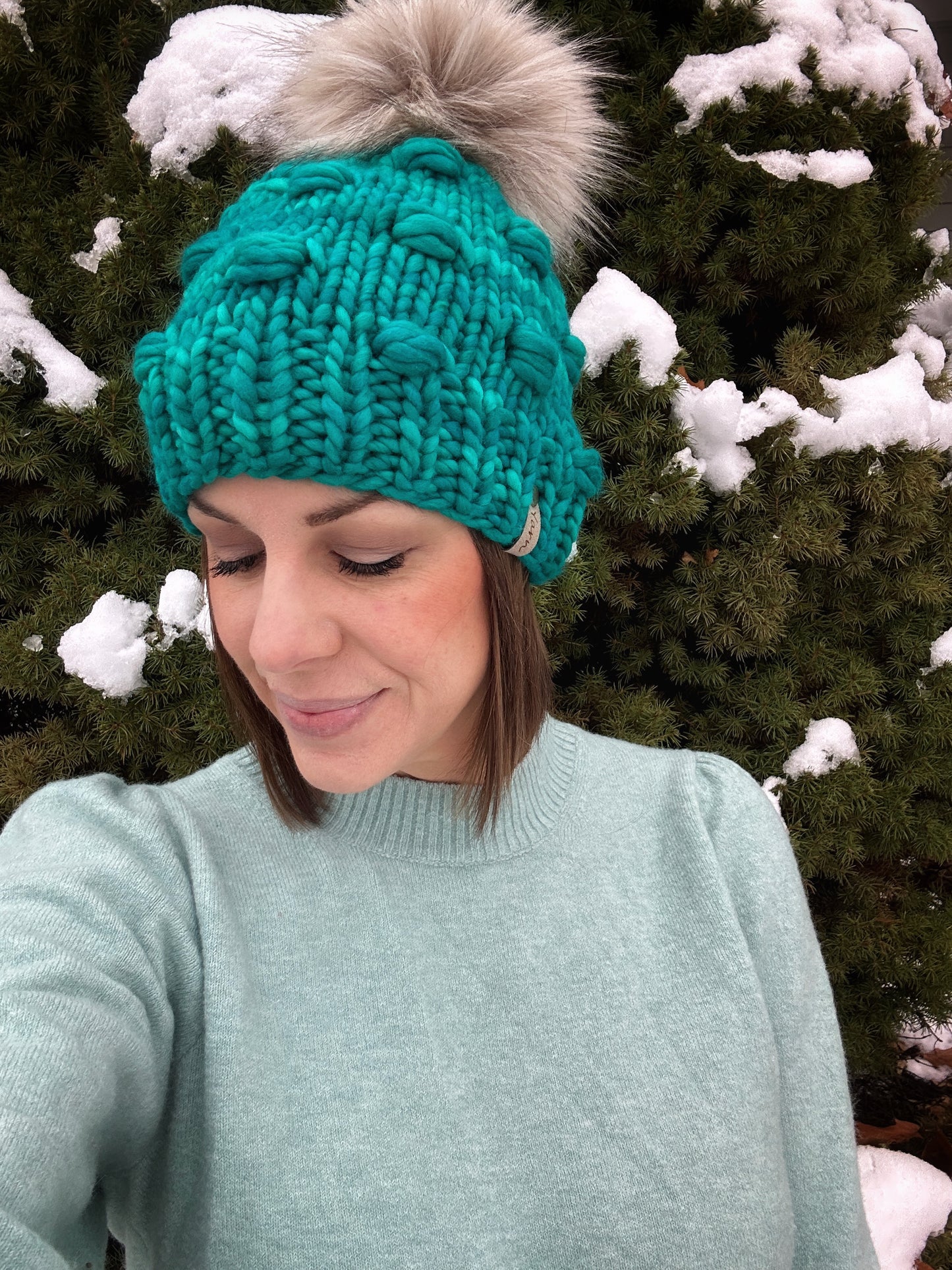 Merino wool knit hat with faux fur Pom