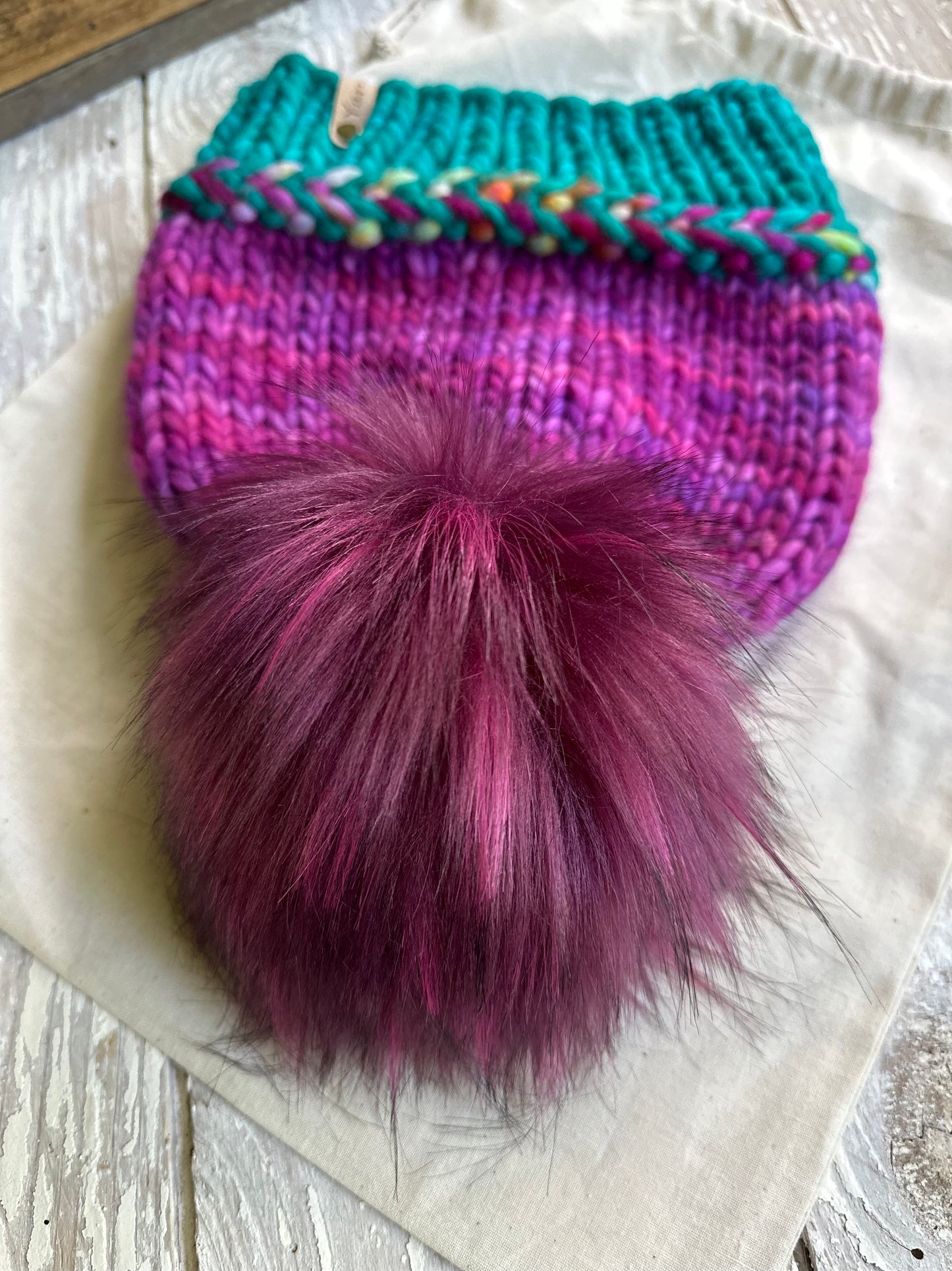 Merino wool knit hat with faux fur Pom