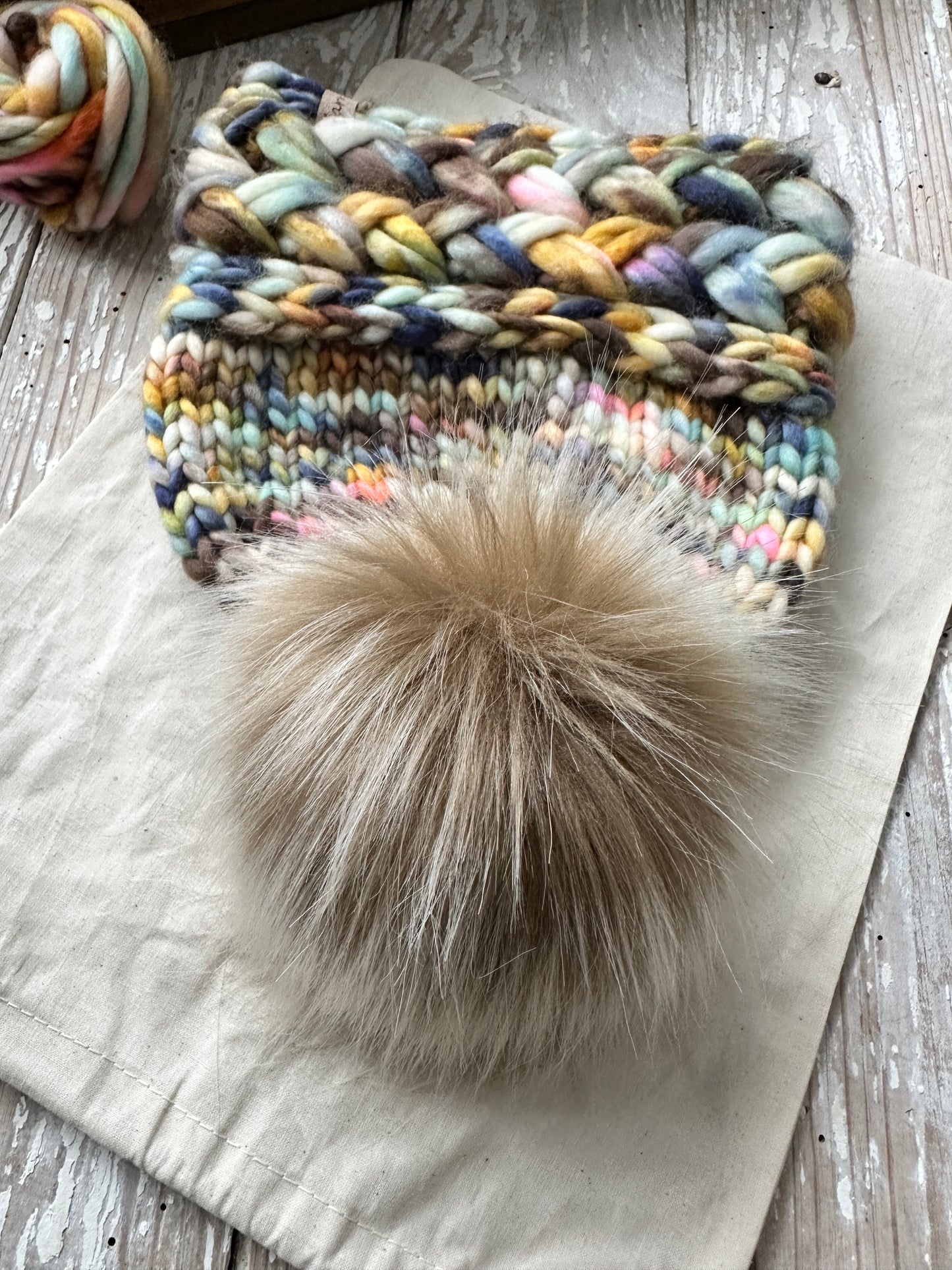 Merino wool knit hat with faux fur Pom