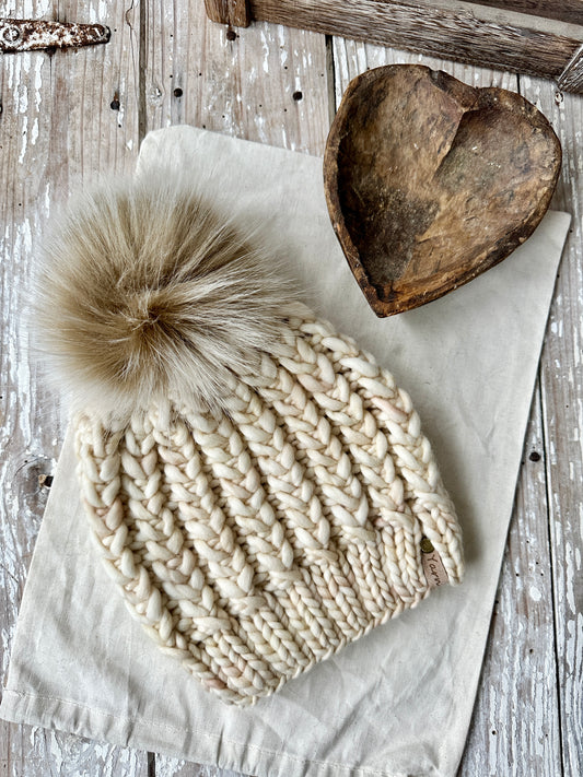 Merino wool knit hat with faux fur Pom