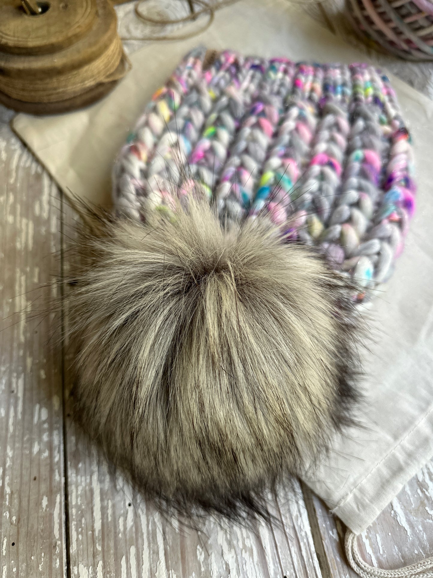 Merino wool knit hat with faux fur Pom