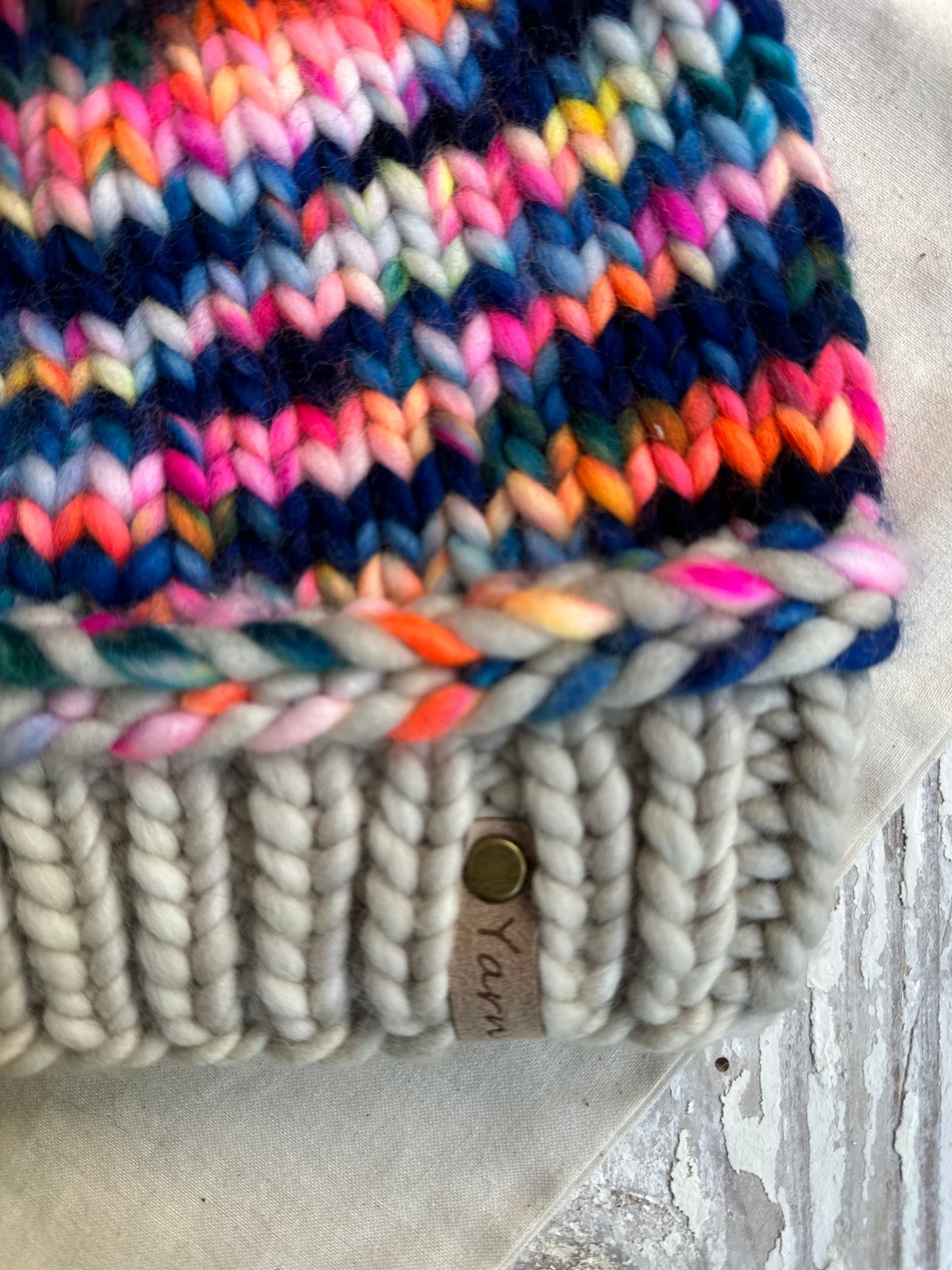 Merino wool knit hat with faux fur Pom