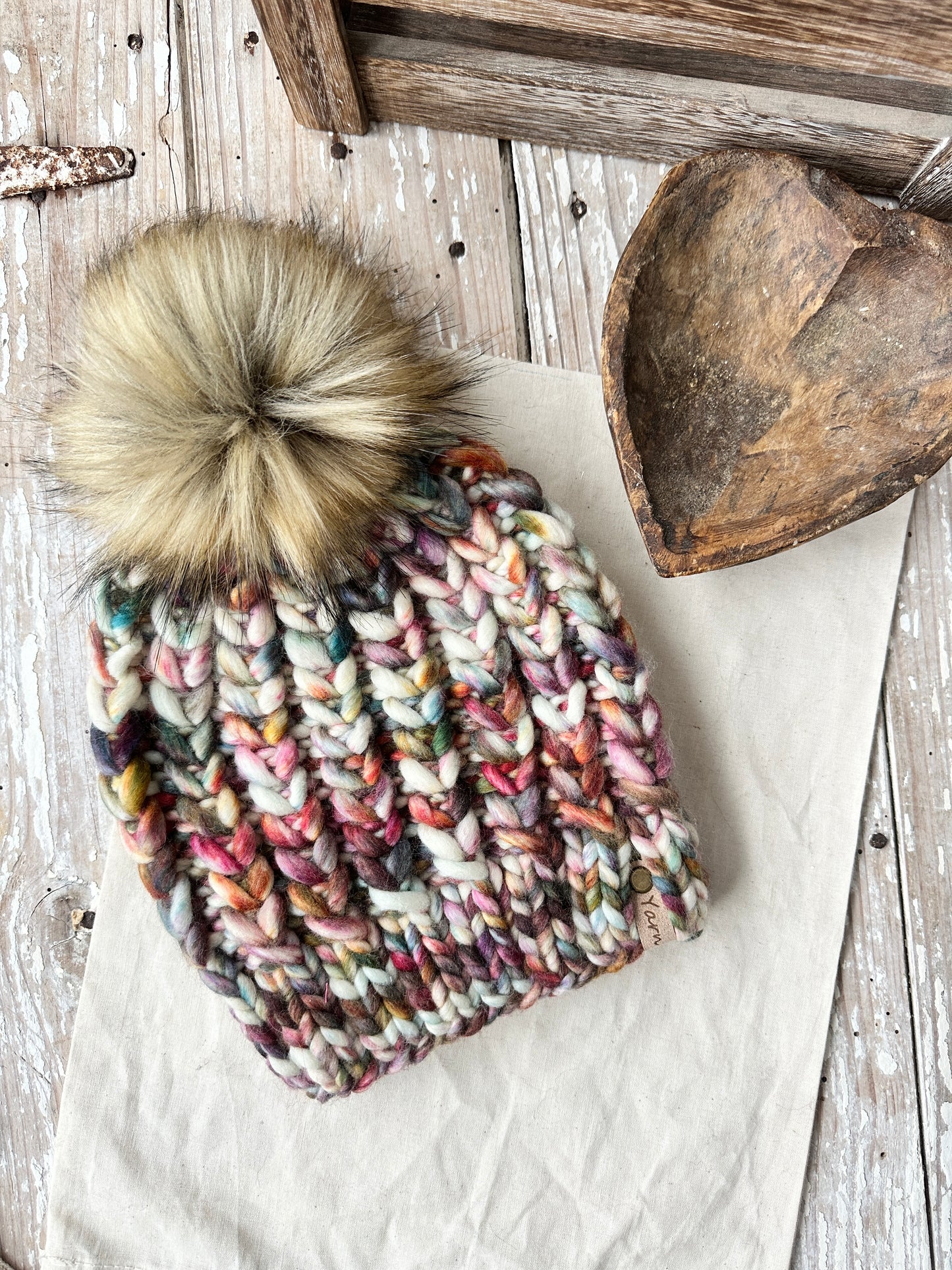 Merino wool knit hat with faux fur Pom